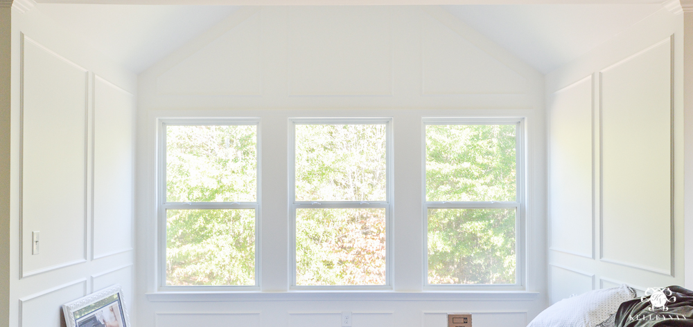 White Paneled Walls in Bedroom Sitting Area