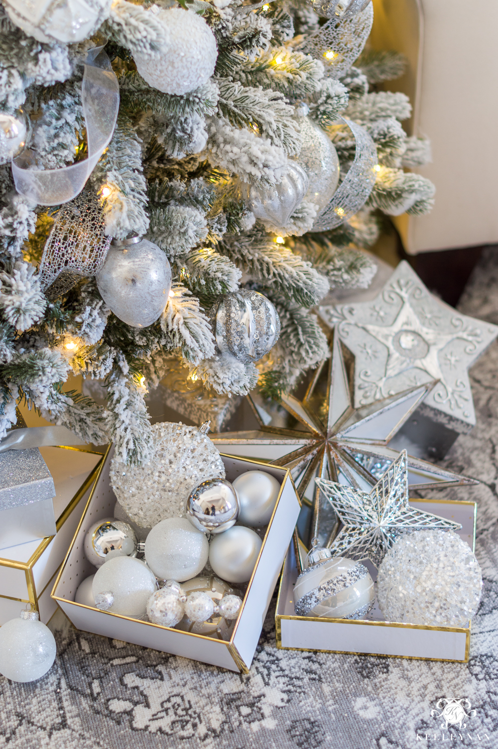 How to style the bottom of a Christmas tree with packages and ornaments