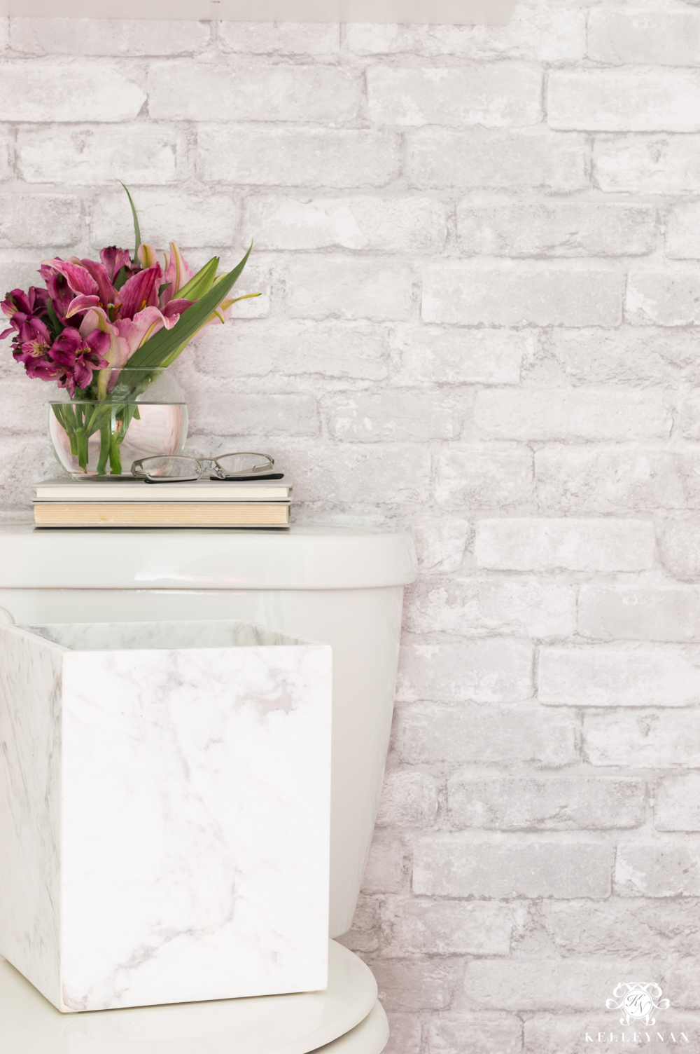 Toilet Room Makeover with white brick temporary wallpaper and marble accents