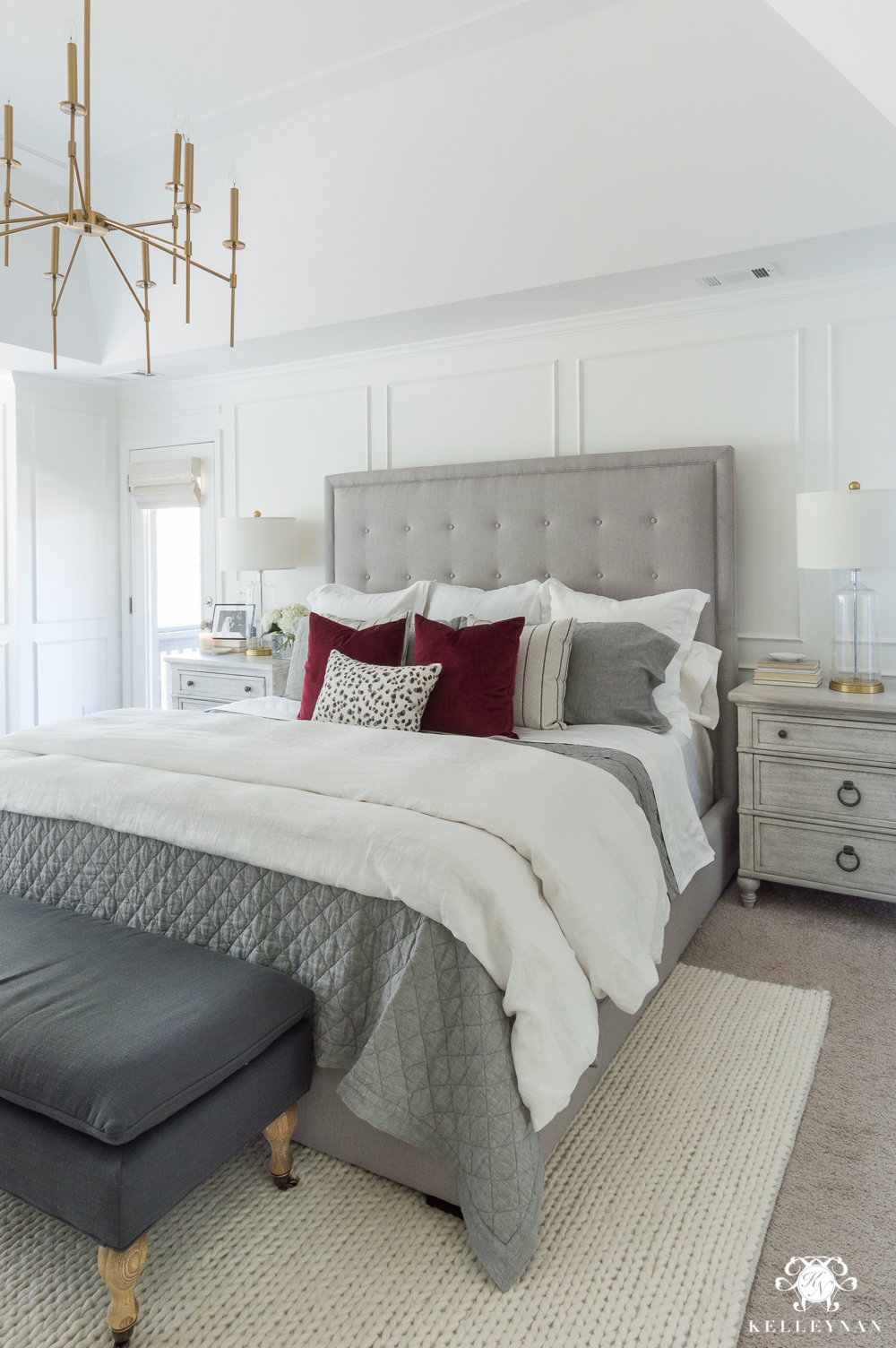 Featured image of post White And Beige Master Bedroom The sophisticated primary bedroom features a comfy bed filled with pillows and sitting area near the fireplace with white mantel topped with gallery frames