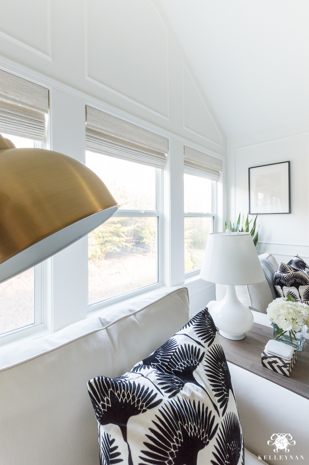 White woven shades in bedroom sitting nook