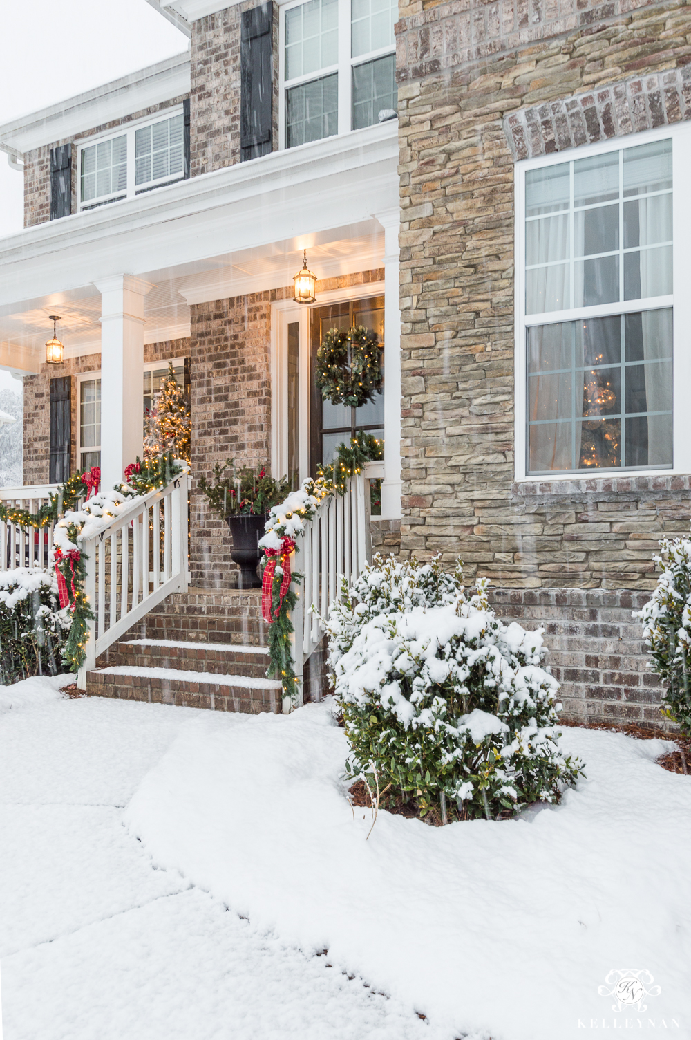 Snowy Front Porch Decorated for Christmas