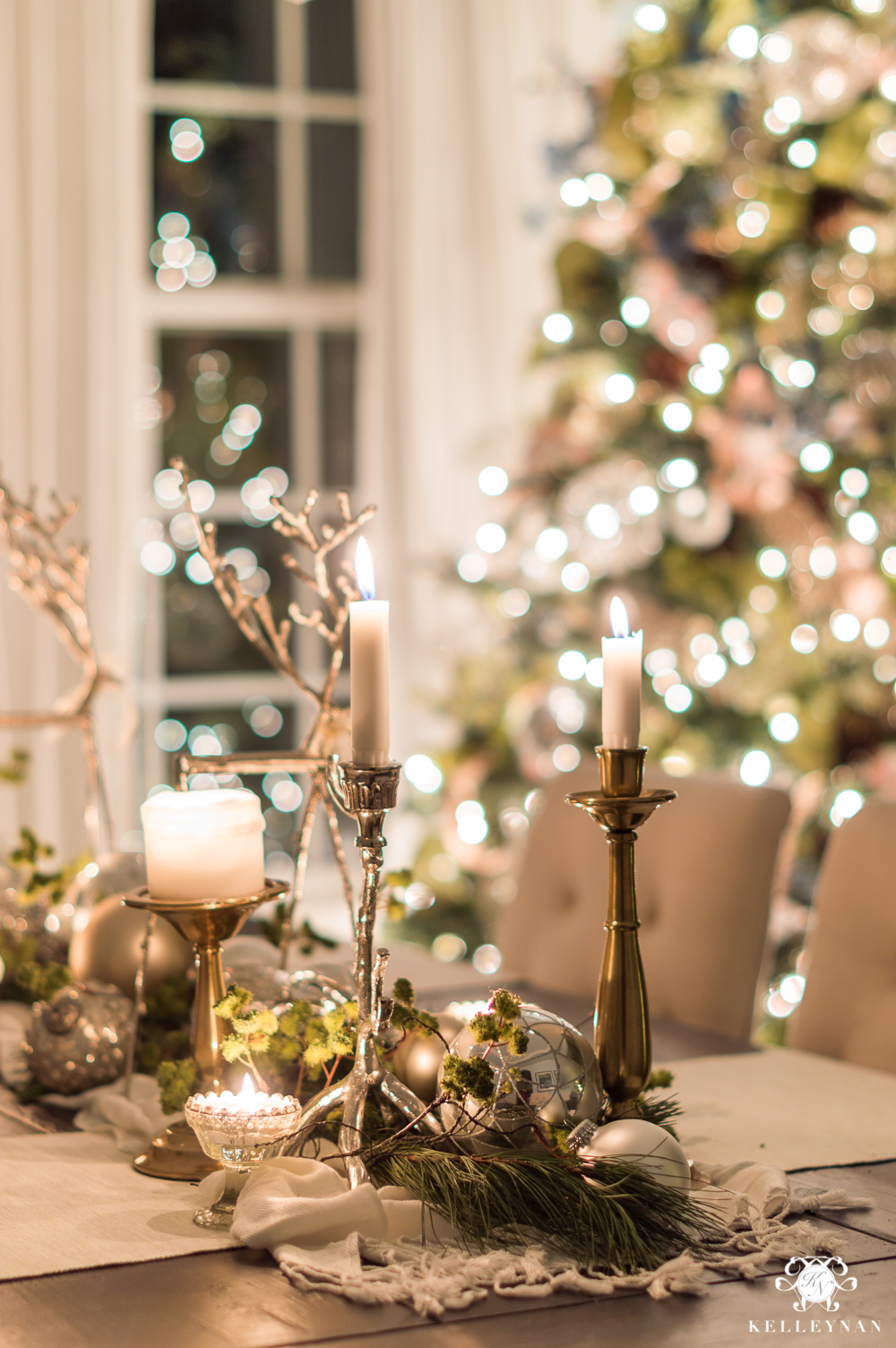 Christmas dining room centerpiece with candles