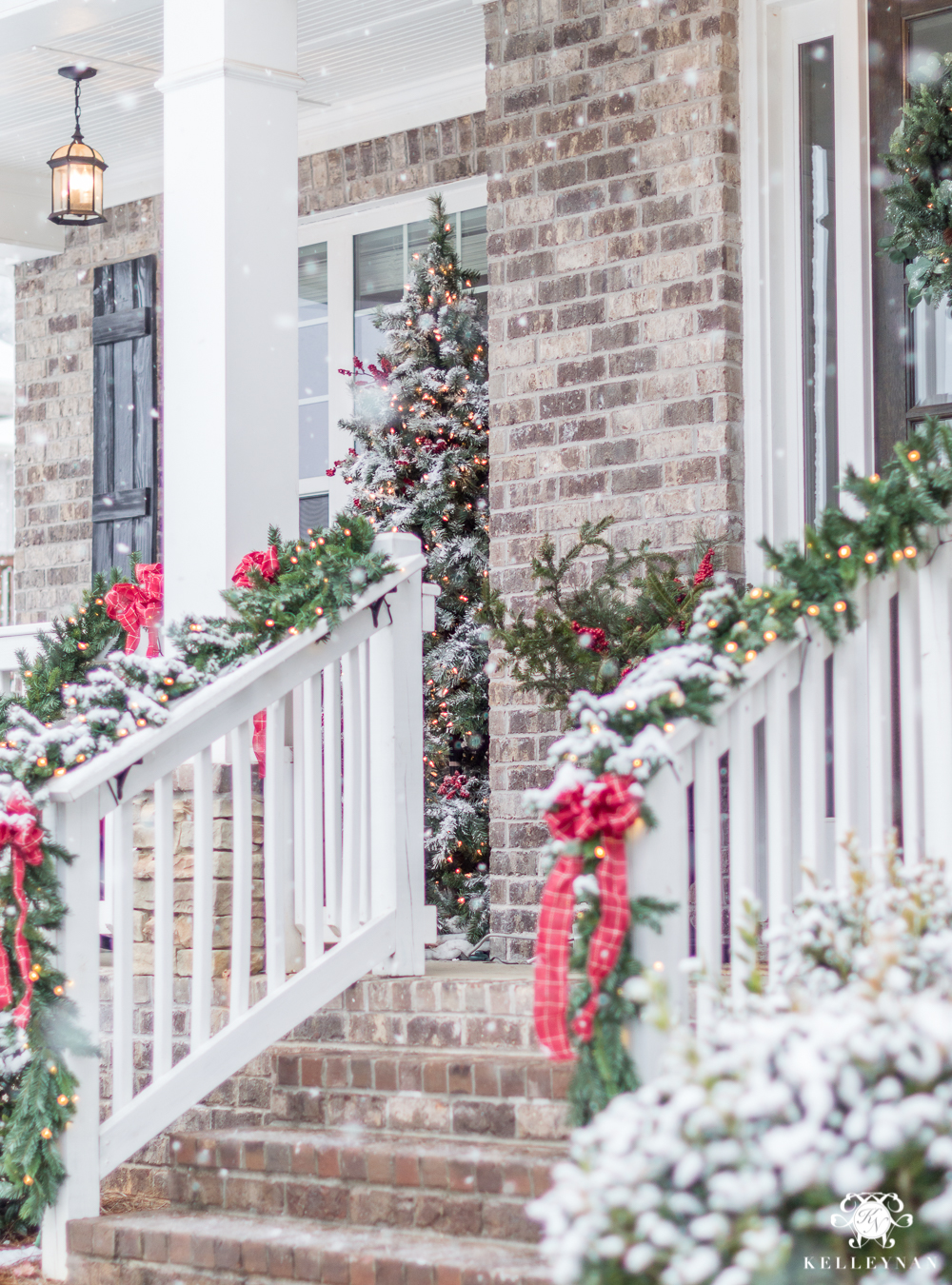 Christmas Porch Decorating Ideas with Flocked Christmas Tree