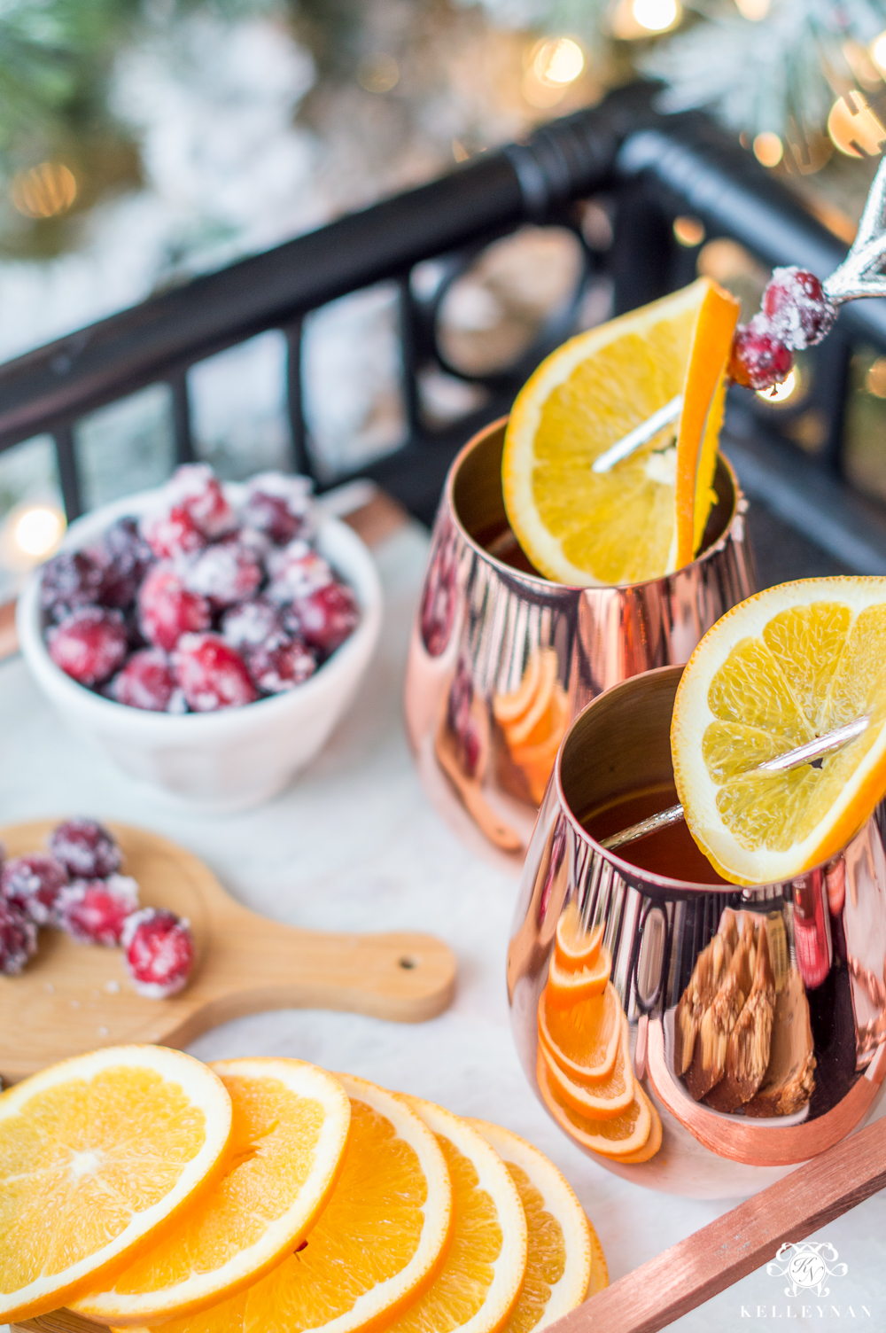 Frosted cranberries with orange slices for christmas drink ideas