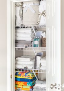 A Small Organized Linen Closet And Ideas To Store Bulky Bedding Kelley Nan