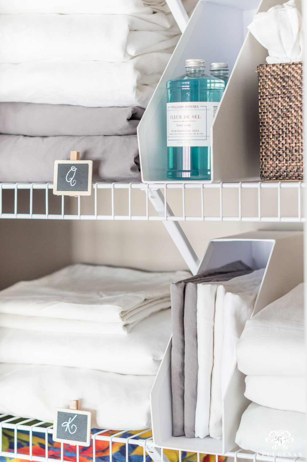 https://kelleynan.com/wp-content/uploads/2018/01/Small-Organized-Linen-Closet-with-Wire-Shelving-and-Sheets.jpg