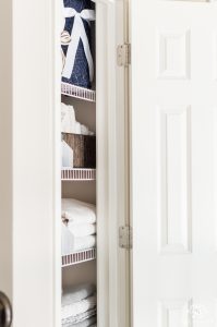 A Small Organized Linen Closet And Ideas To Store Bulky Bedding Kelley Nan