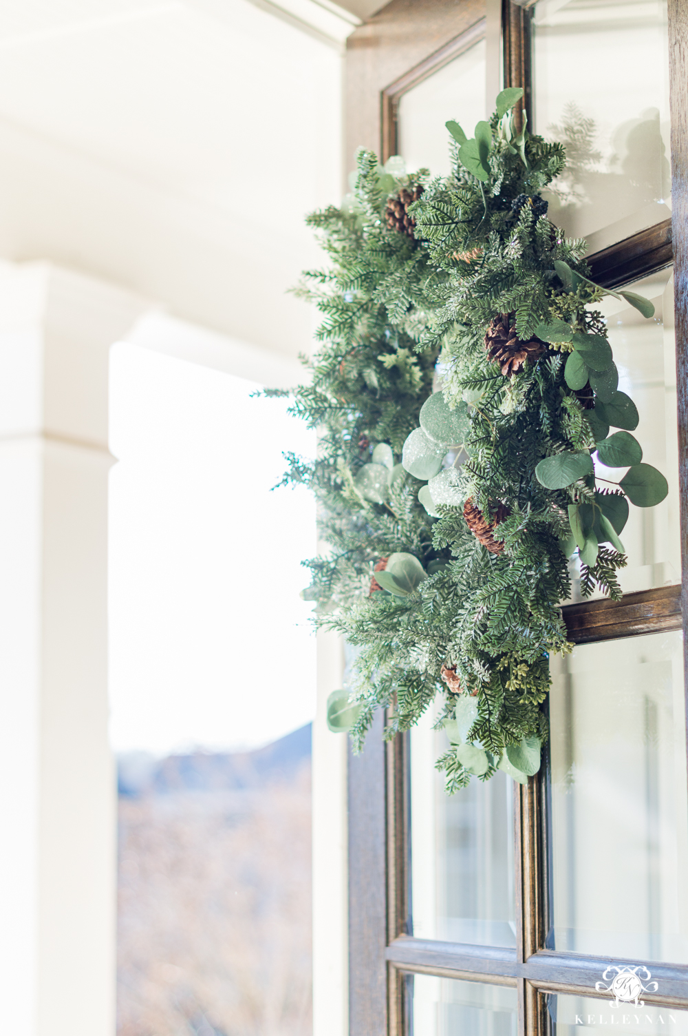 Eucalyptus and green leafy winter wreath to transition after the holidays