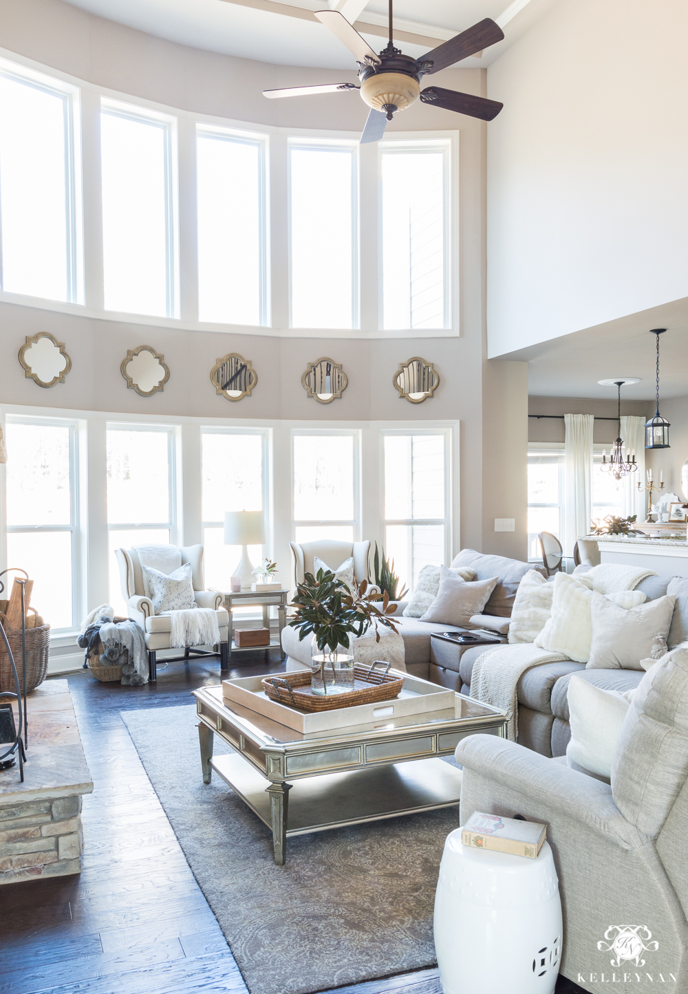 Two story bow of windows in living room 