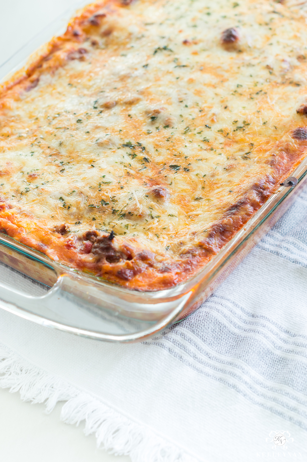 Simple two-layer lasagna that only bakes for 25 minutes- a crown pleasing favorite Italian dish!