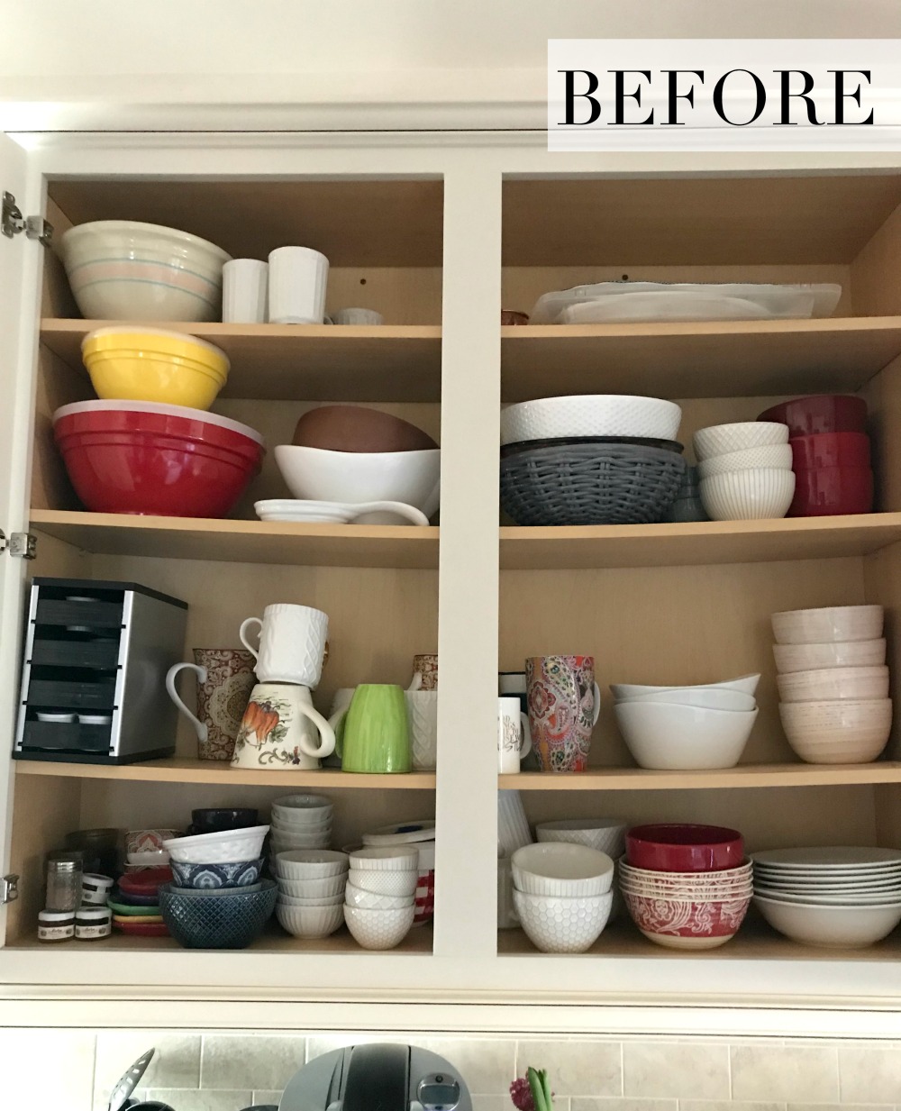 This pic gives a great idea of how to organize your kitchen lids, bowls,  etc.