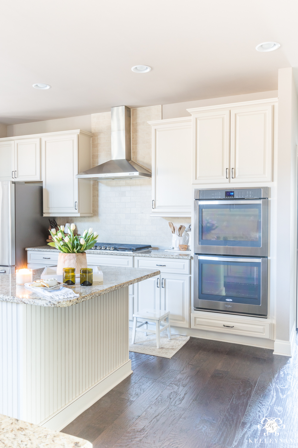 Neutral Kitchen with SW Perfect Greige paint and cream cabinets