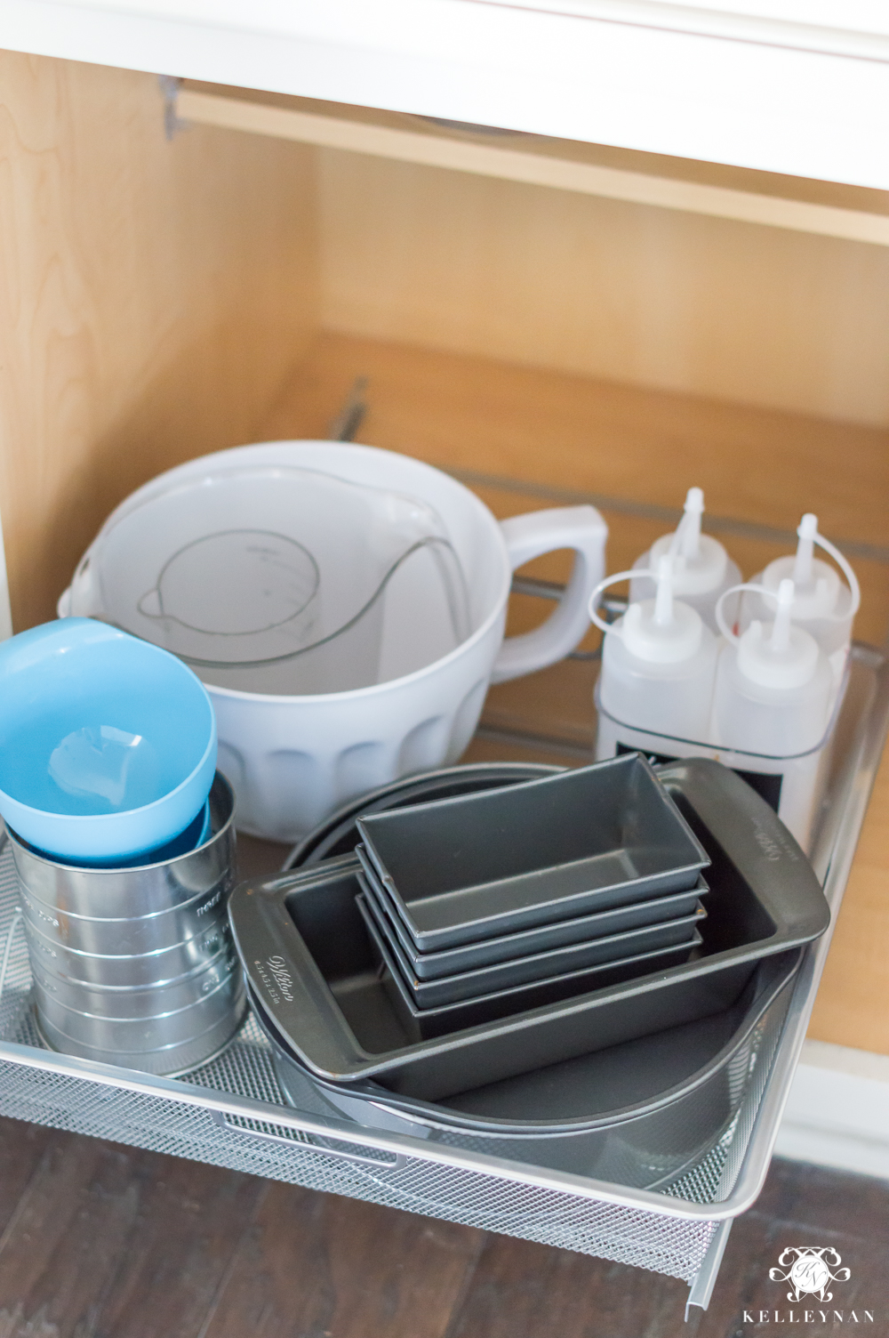 Organizing Baking Supplies in a roll out cabinet drawer