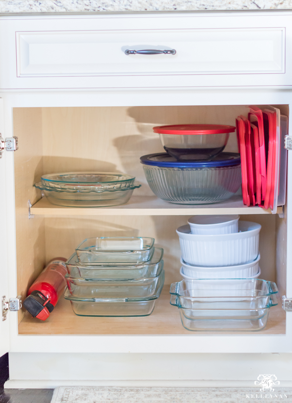 https://kelleynan.com/wp-content/uploads/2018/02/Organized-Kitchen-Cabinets-Casserole-and-Baking-Dish-Organization.jpg