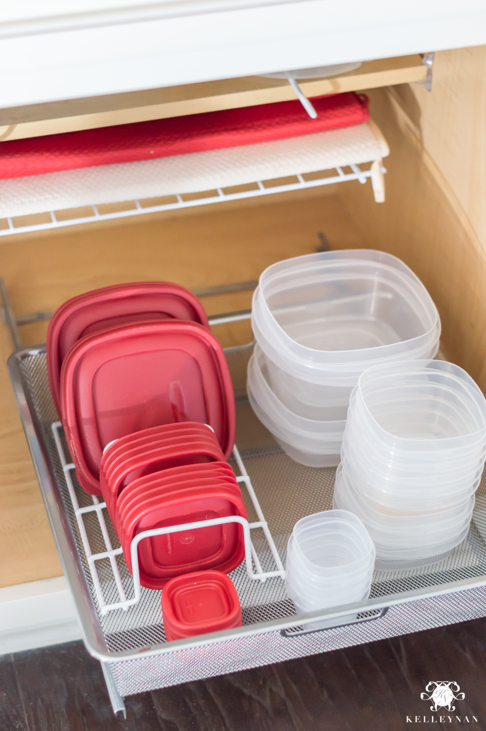 Rubbermaid food storage containers organized in the kitchen cabinets