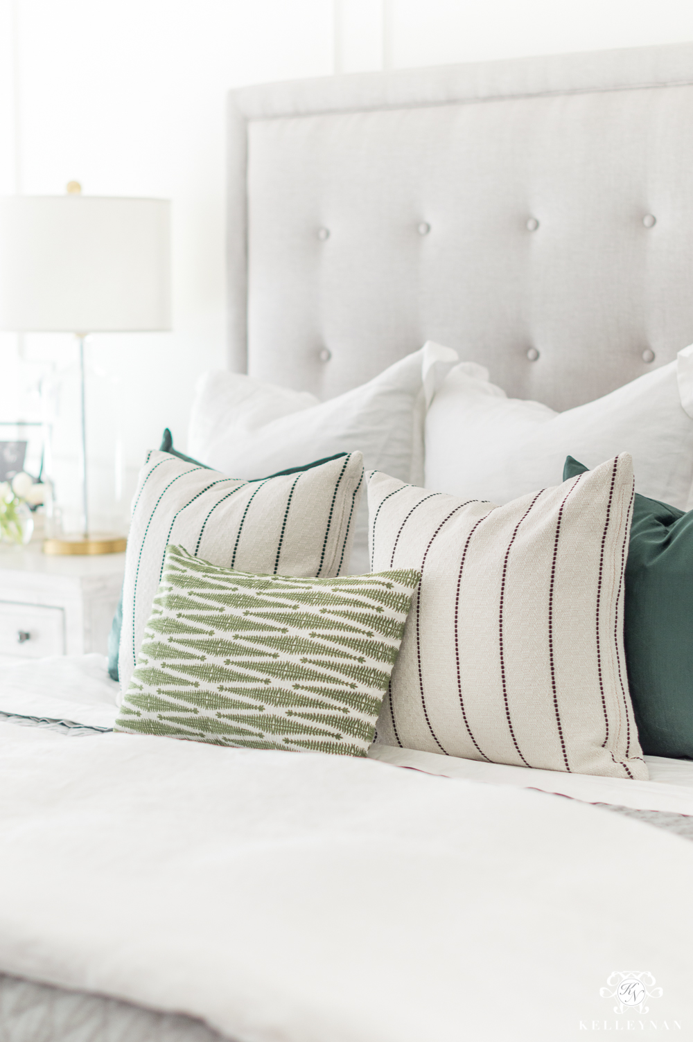 https://kelleynan.com/wp-content/uploads/2018/03/Green-and-Neutral-Spring-Bedding-in-Master-Bedroom.jpg