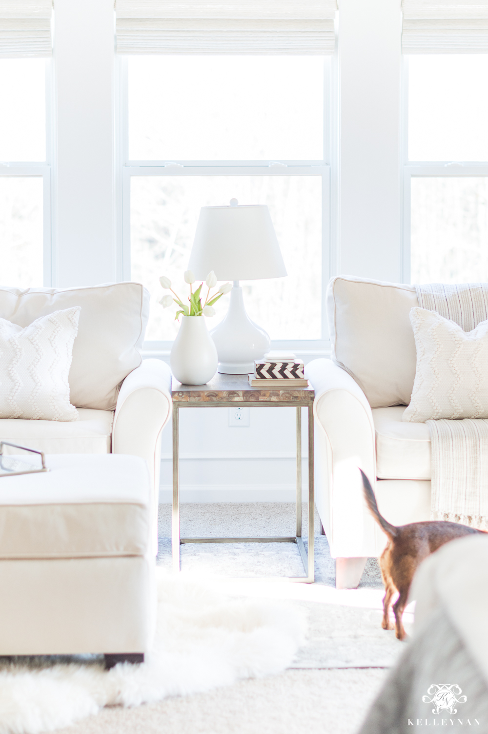 Oversized White Club Chairs in Sitting Area of Master Bedroom