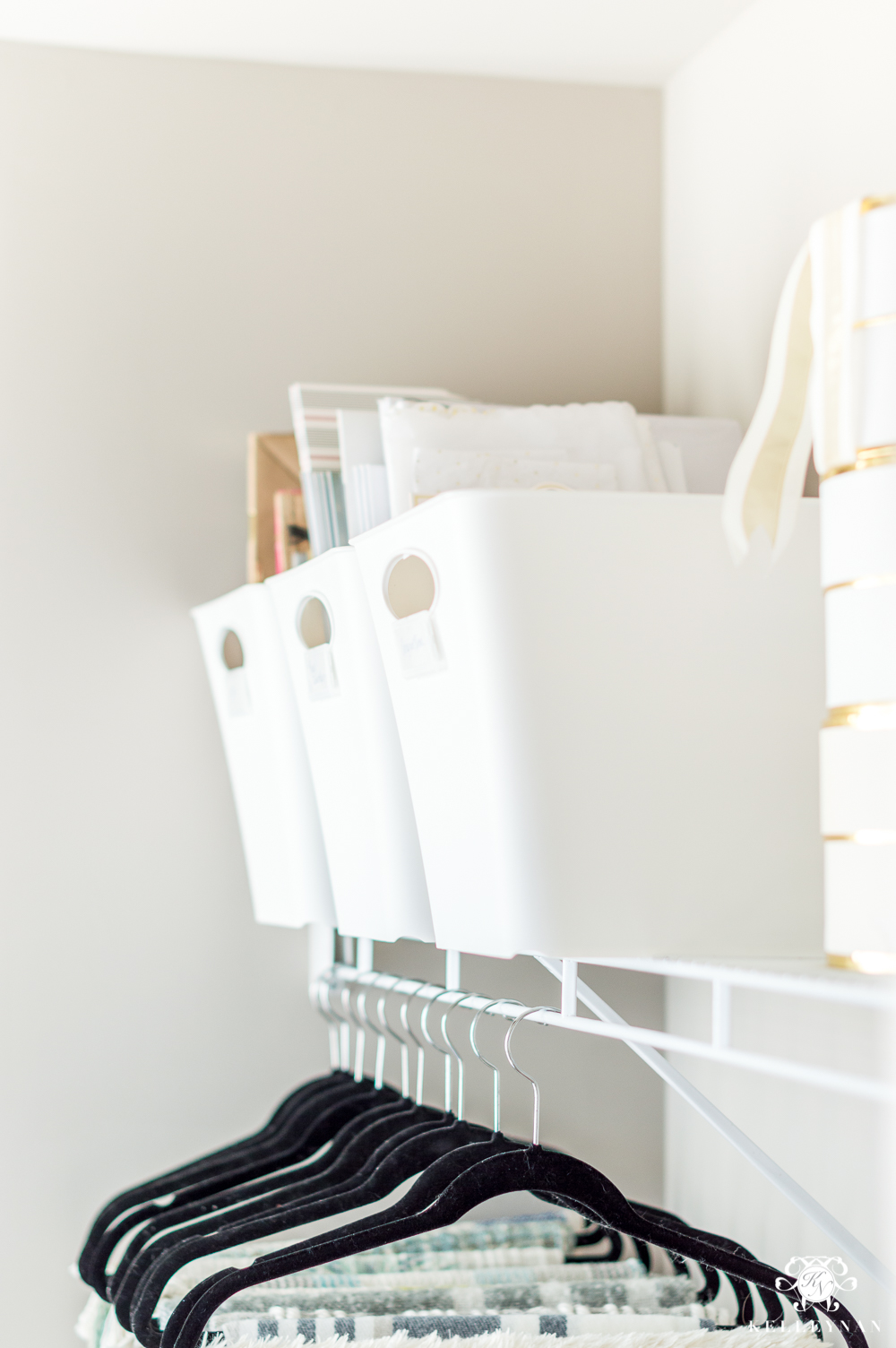 Gift wrap bins and organization in the closet