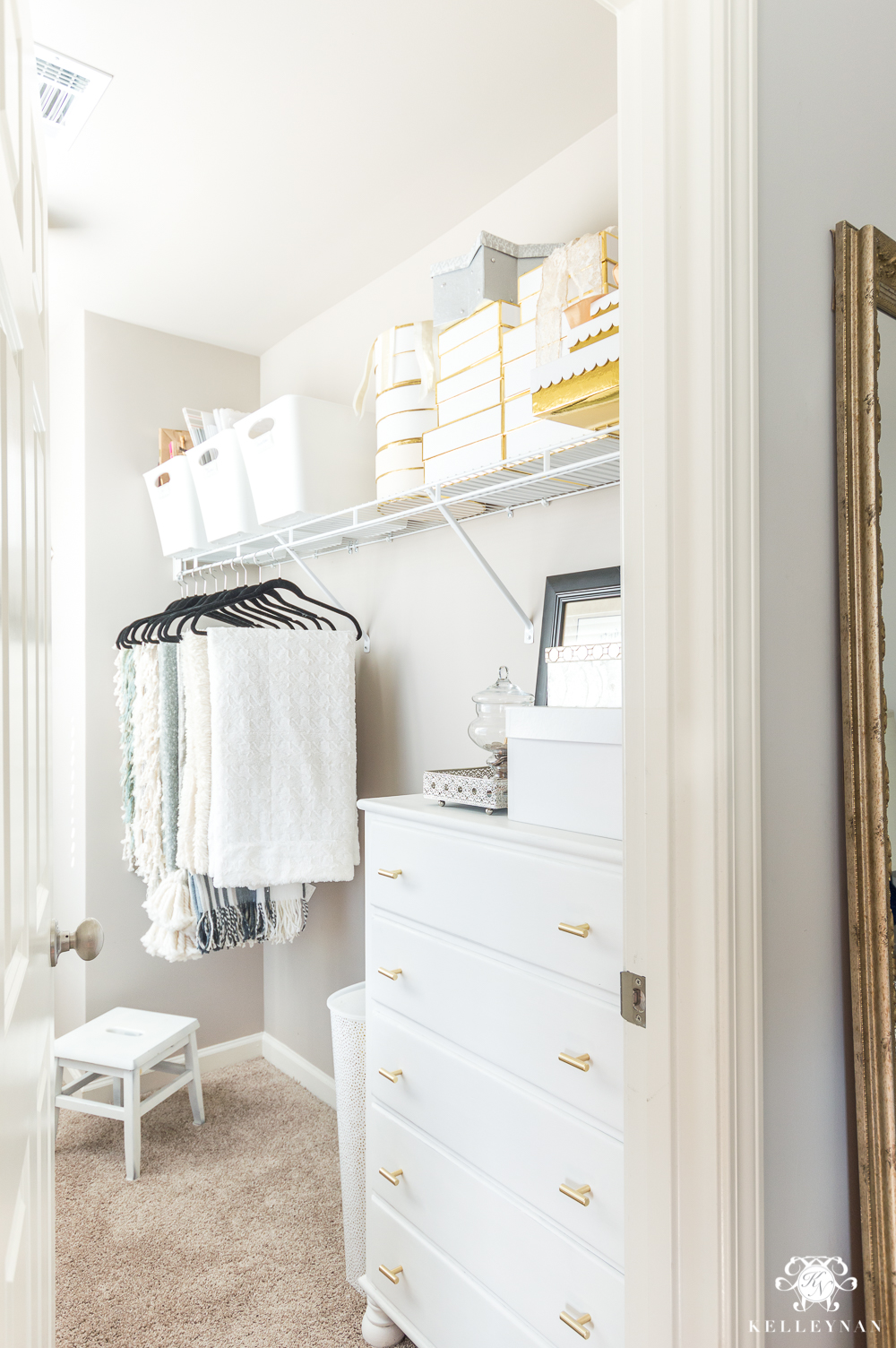 https://kelleynan.com/wp-content/uploads/2018/03/Organized-Wrapping-Closet-with-Pillows-and-Throws-with-Wire-Shelving.jpg