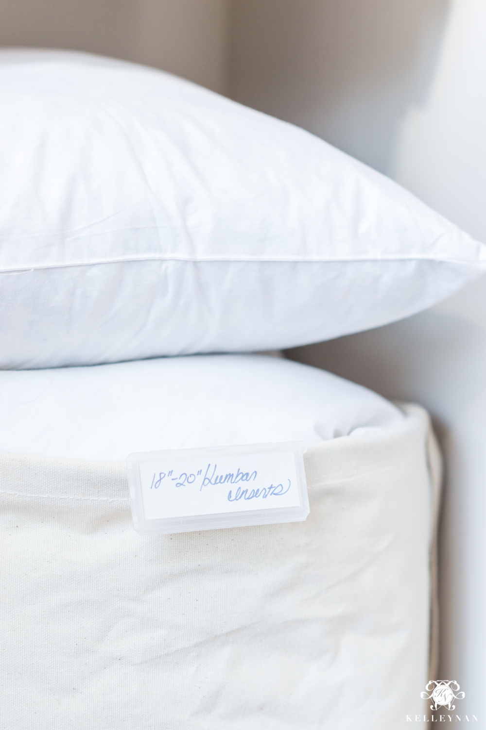 Organizing pillow inserts by size with labels