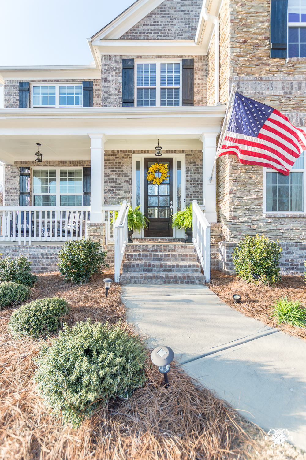 Traditional Craftsman Style Home with American Flag