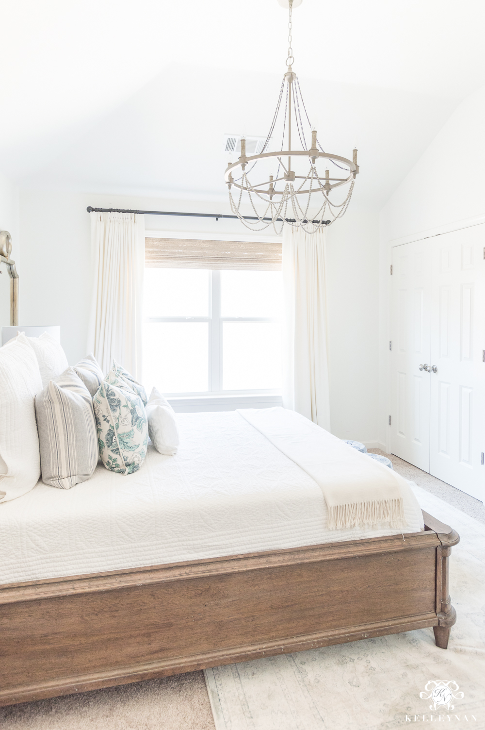 Beaded Chandelier over guest bed for guest bedroom design inspo