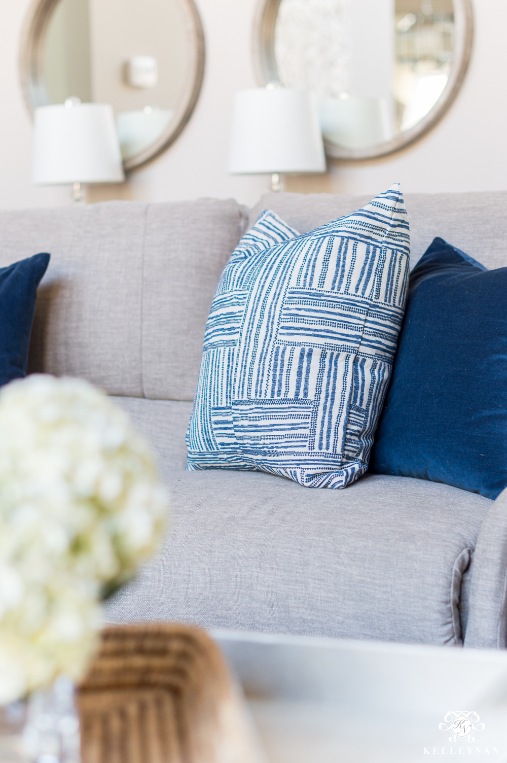 Blue and White Pillows on Sectional Sofa