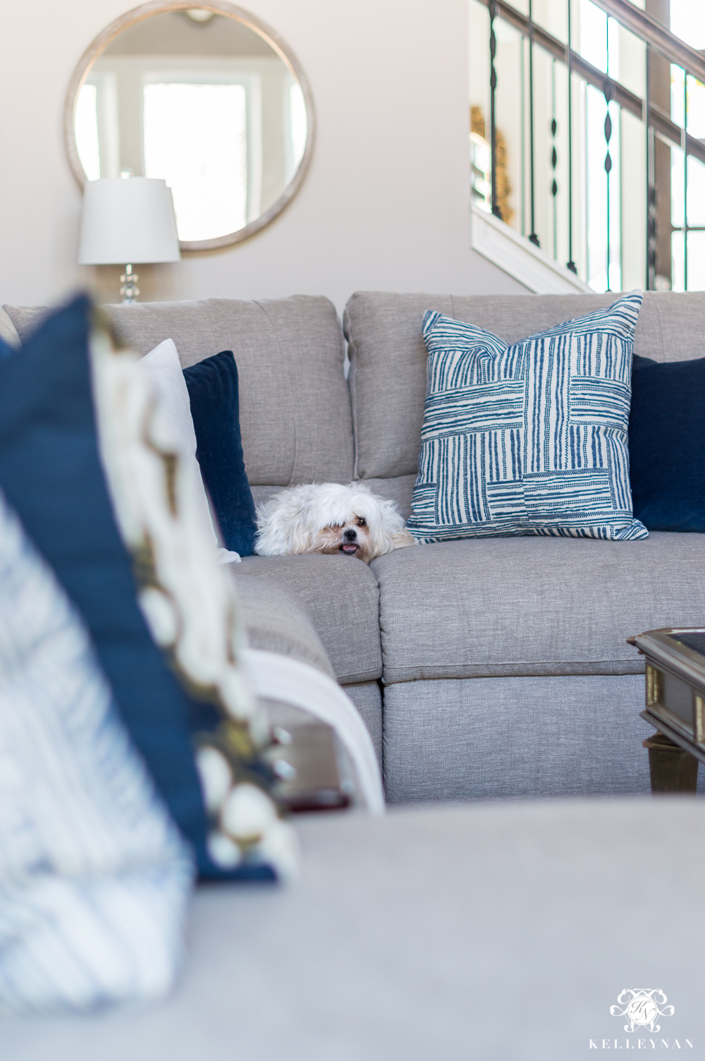 Blue and White Pillows on Sectional for Spring