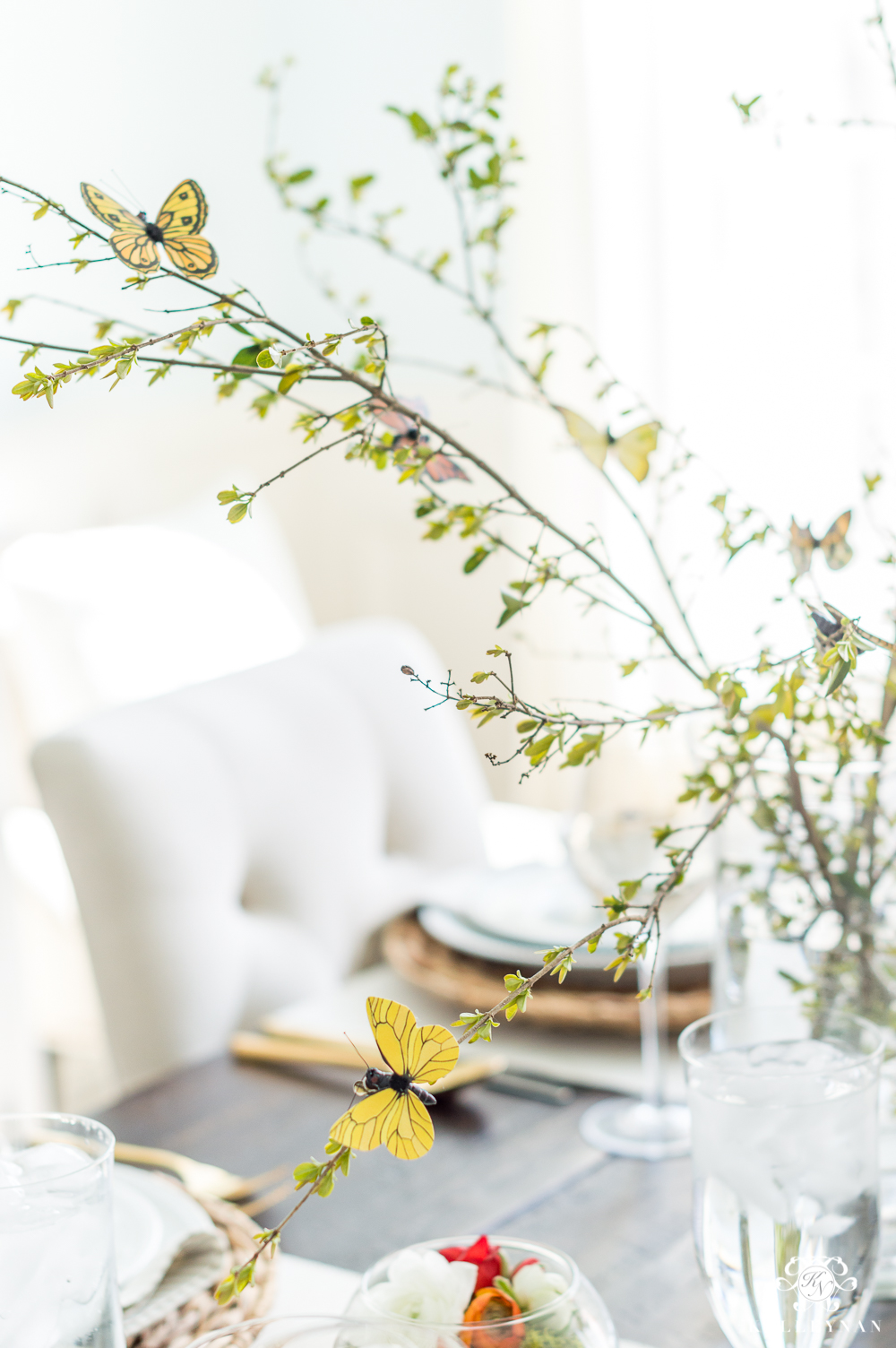 Spring butterfly centerpiece with whimsical branches