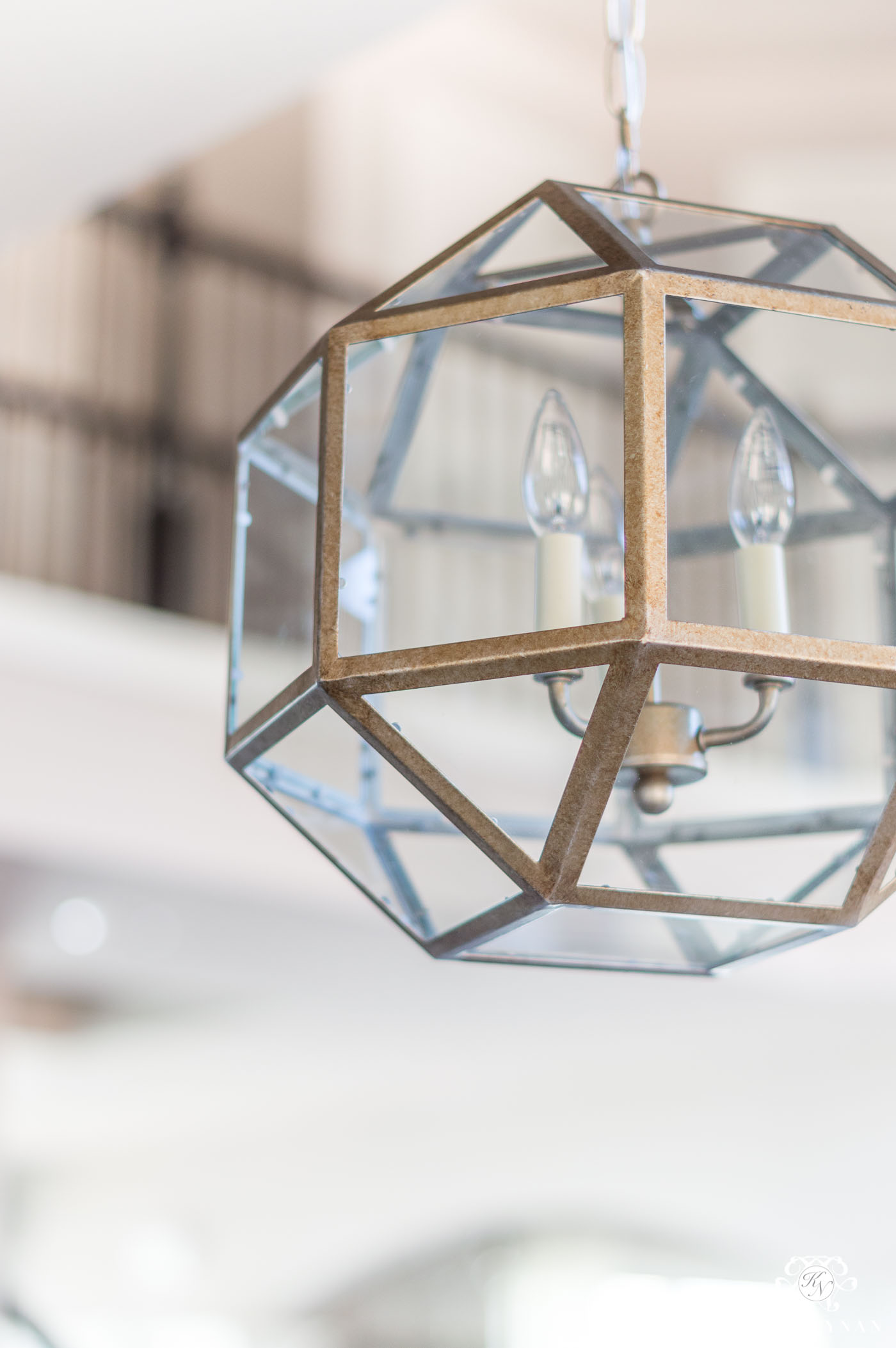 Glass Pendant Lantern Lights Over Kitchen Bar