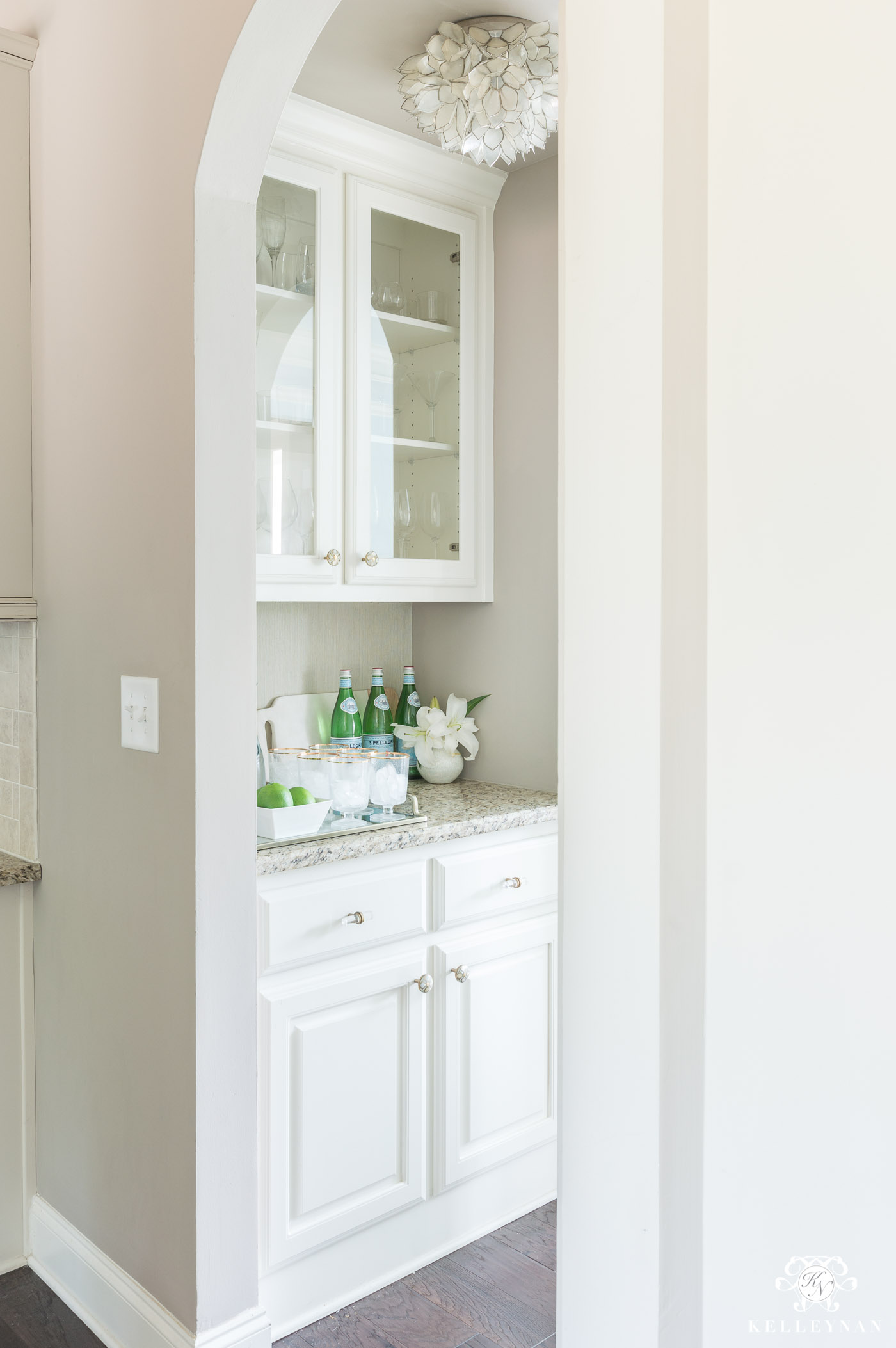 Small butler's pantry makeover with white cabinets and greige paint