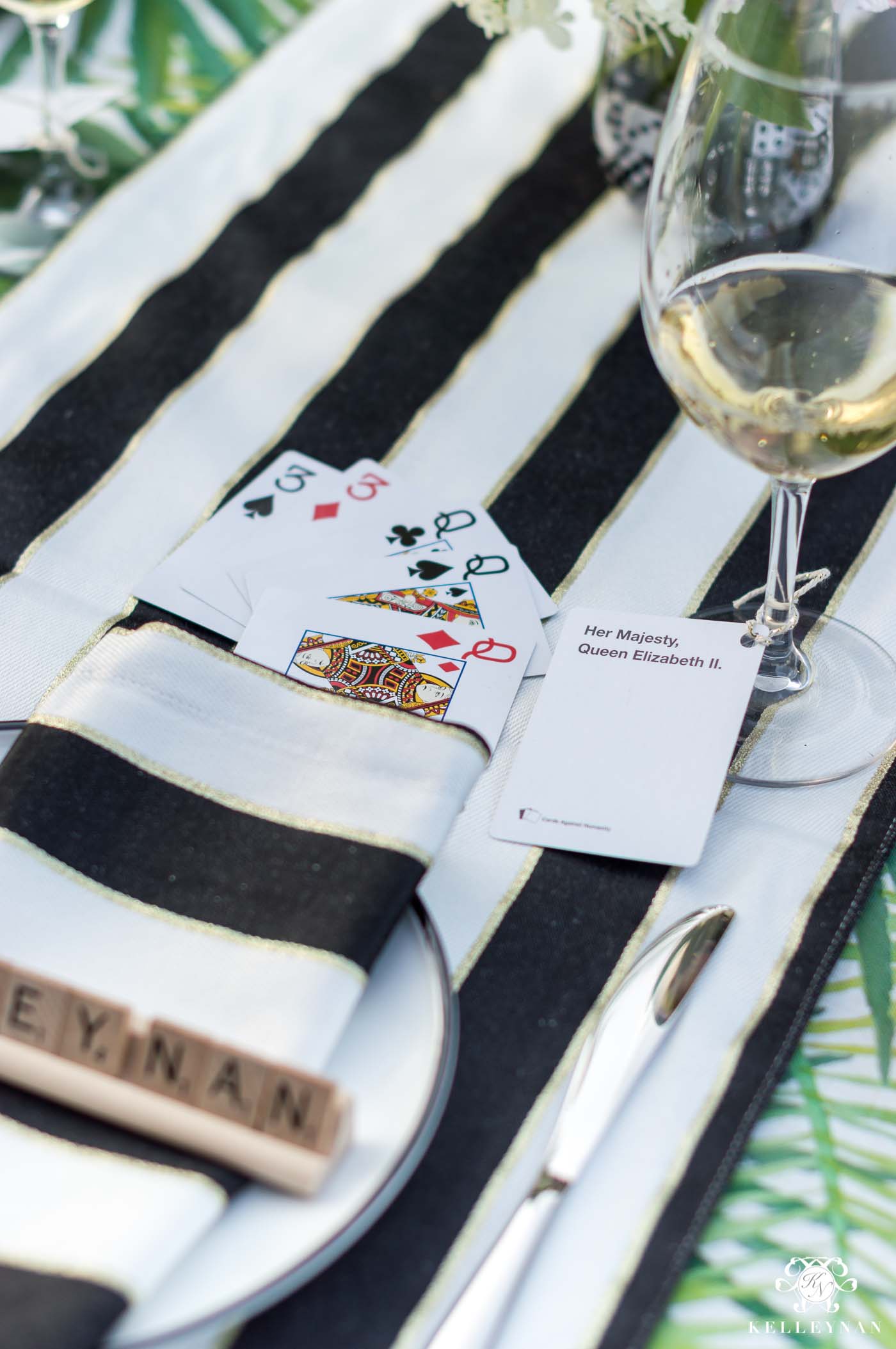 Game night wine charms using cards against humanity people cards