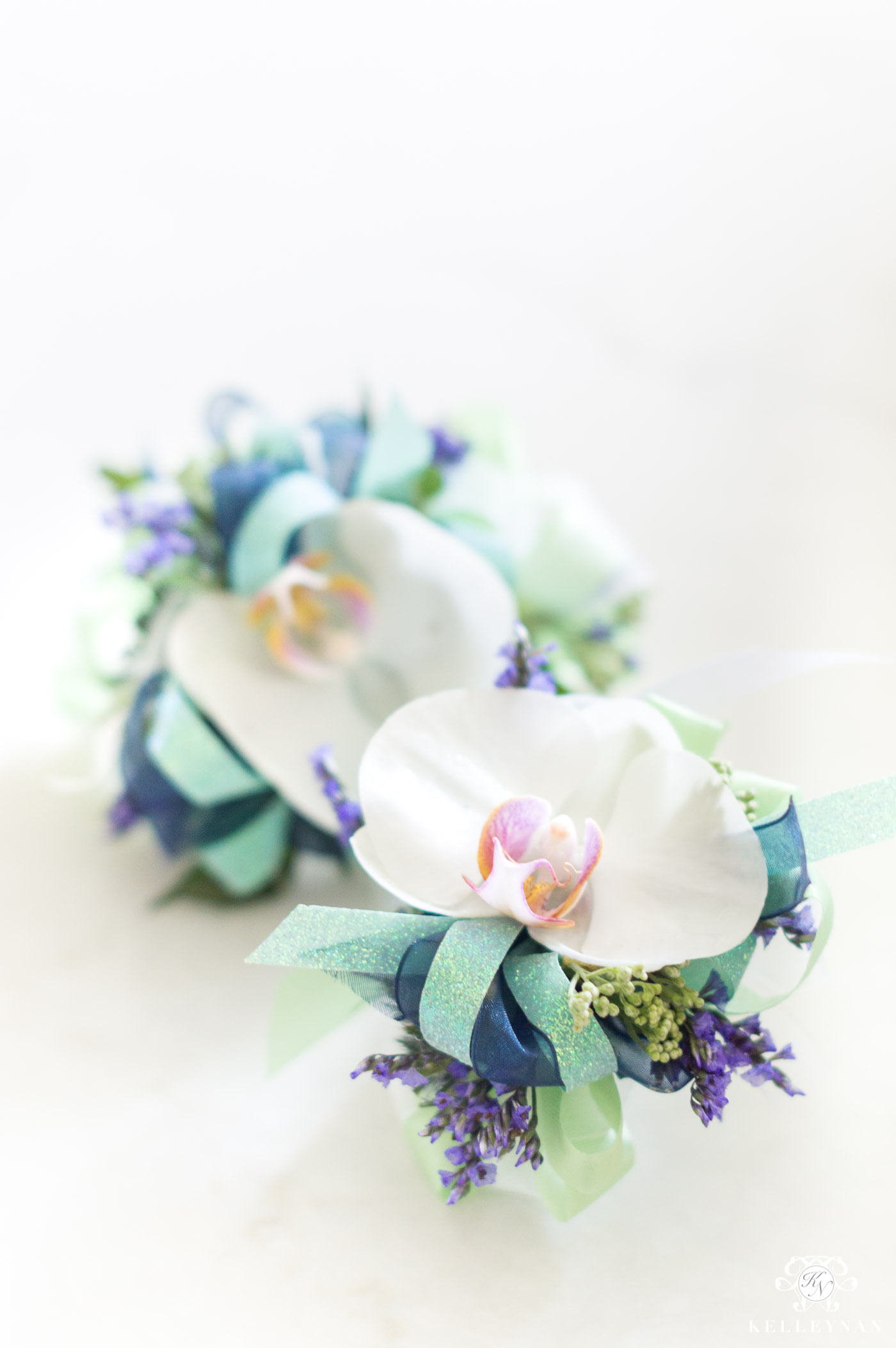 Orchid Corsage with Navy and Mint Green Color Scheme