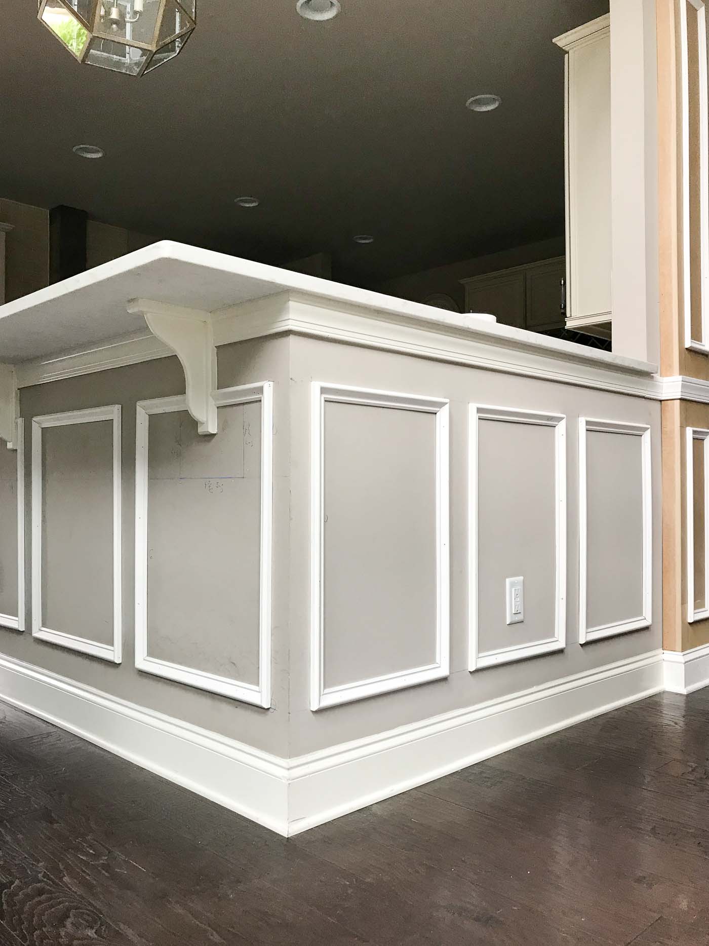 How to make drywall look like a built-in piece of furniture under the kitchen bar