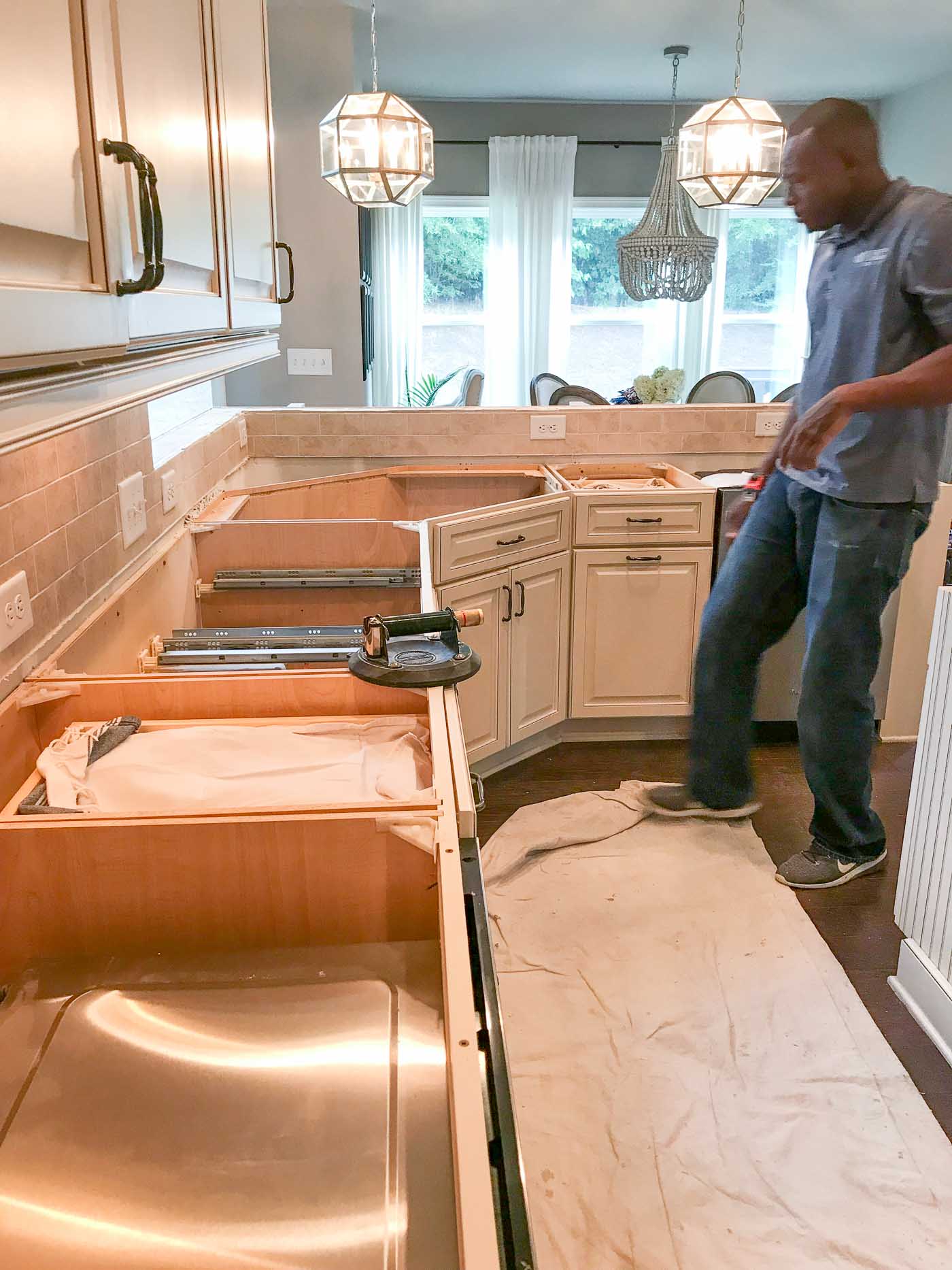 Switching granite countertops for quartz to brighten the kitchen