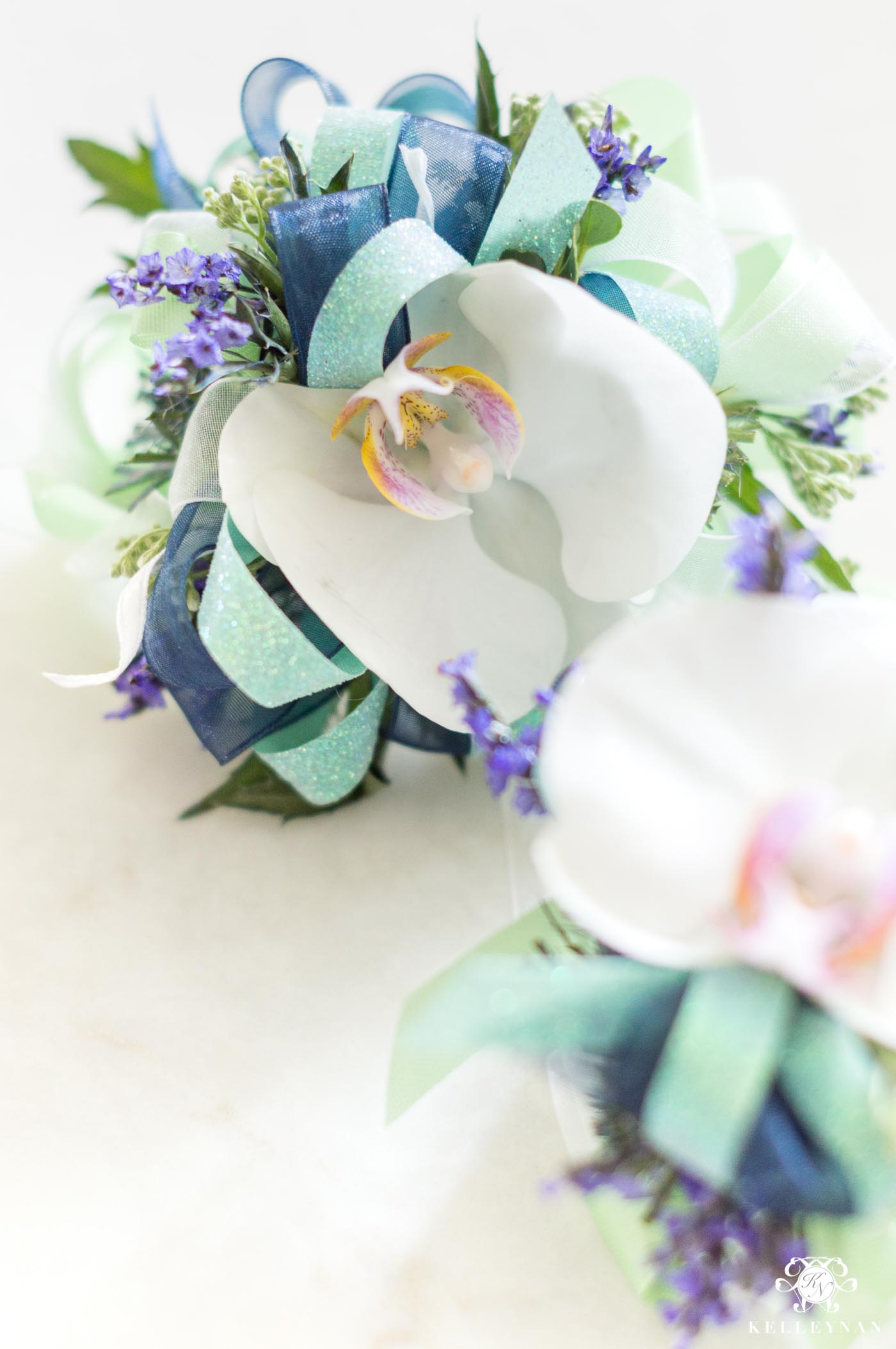 Orchid Corsages for Mom and Sister at Baby Shower