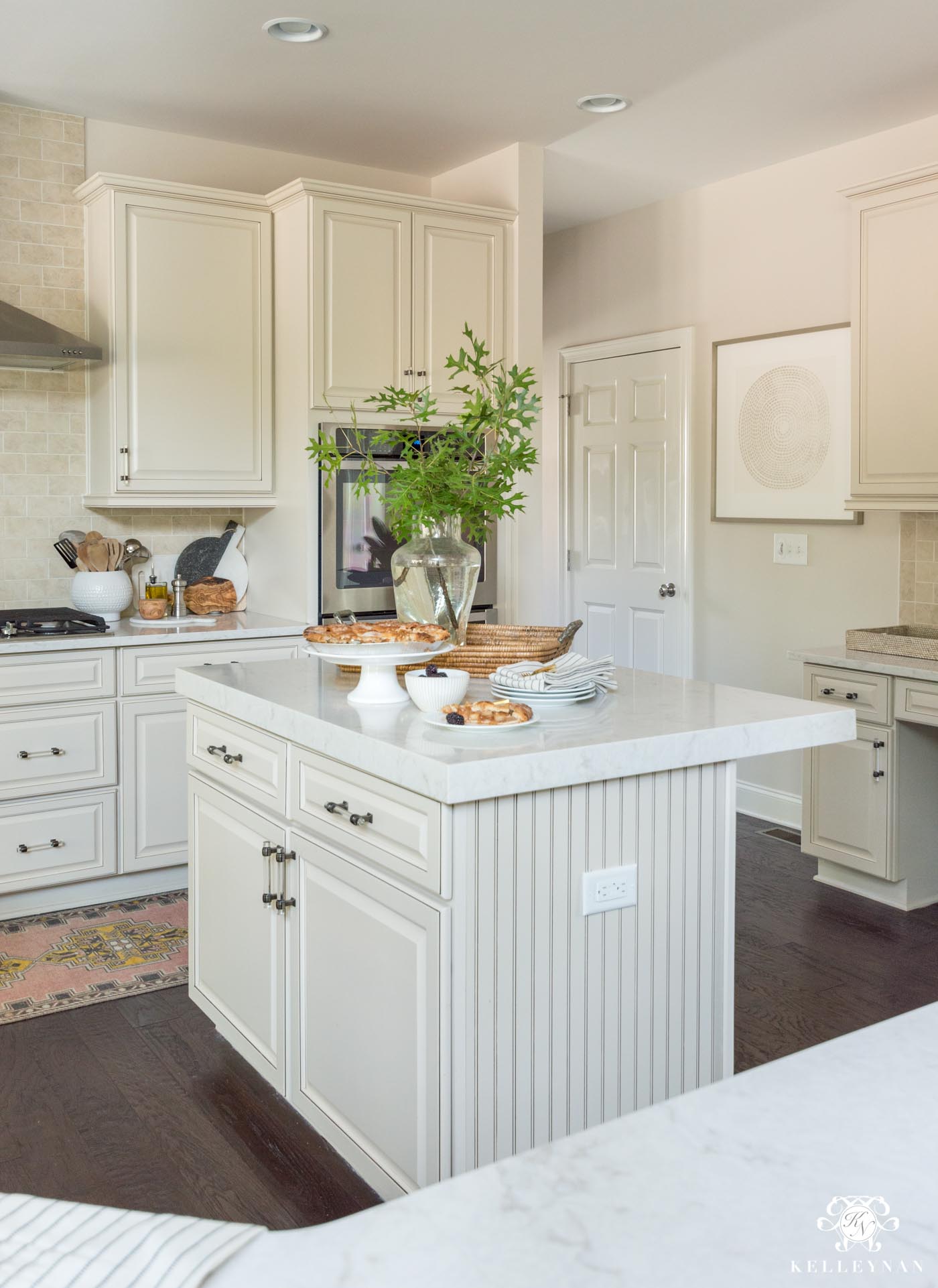 Cream Cabinet Kitchen Makeover With White Quartz 