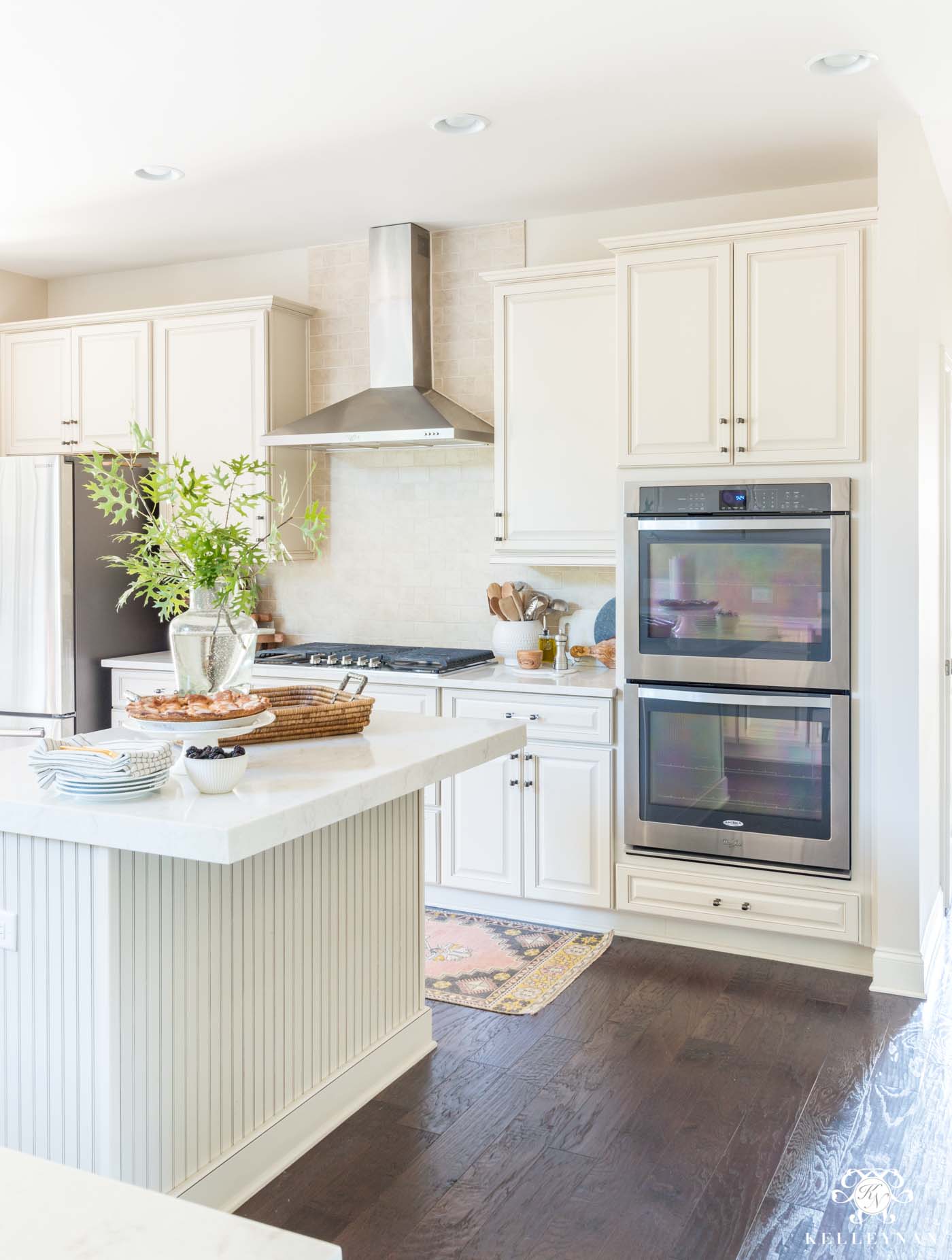 How to update a cream kitchen with raised panel cabinets