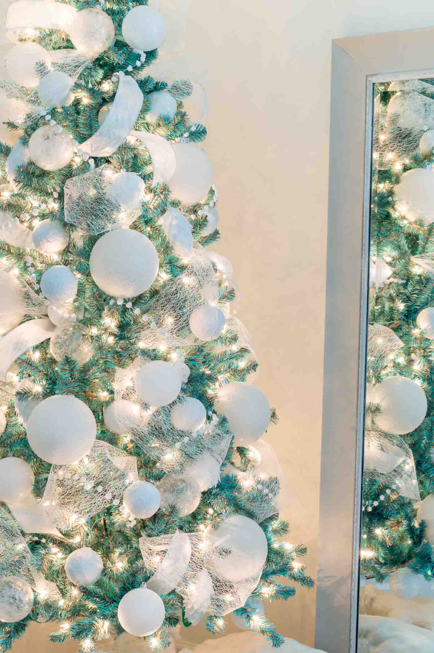 Christmas Tree Themes with a Tiffany Blue Tree and White Decorations
