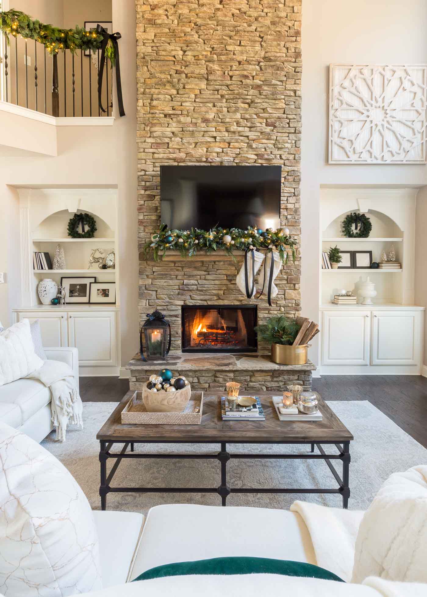 Christmas living room decor and decorated fireplace mantel