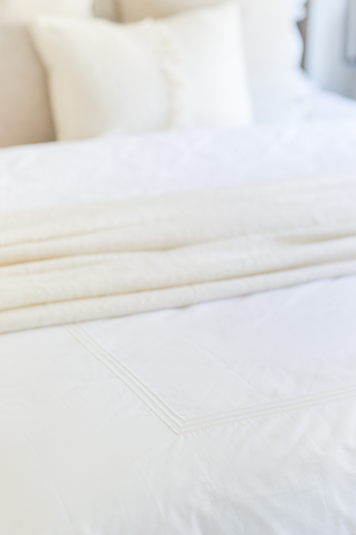 How to Make Your Bed by Mixing & Matching Favorite Bedding