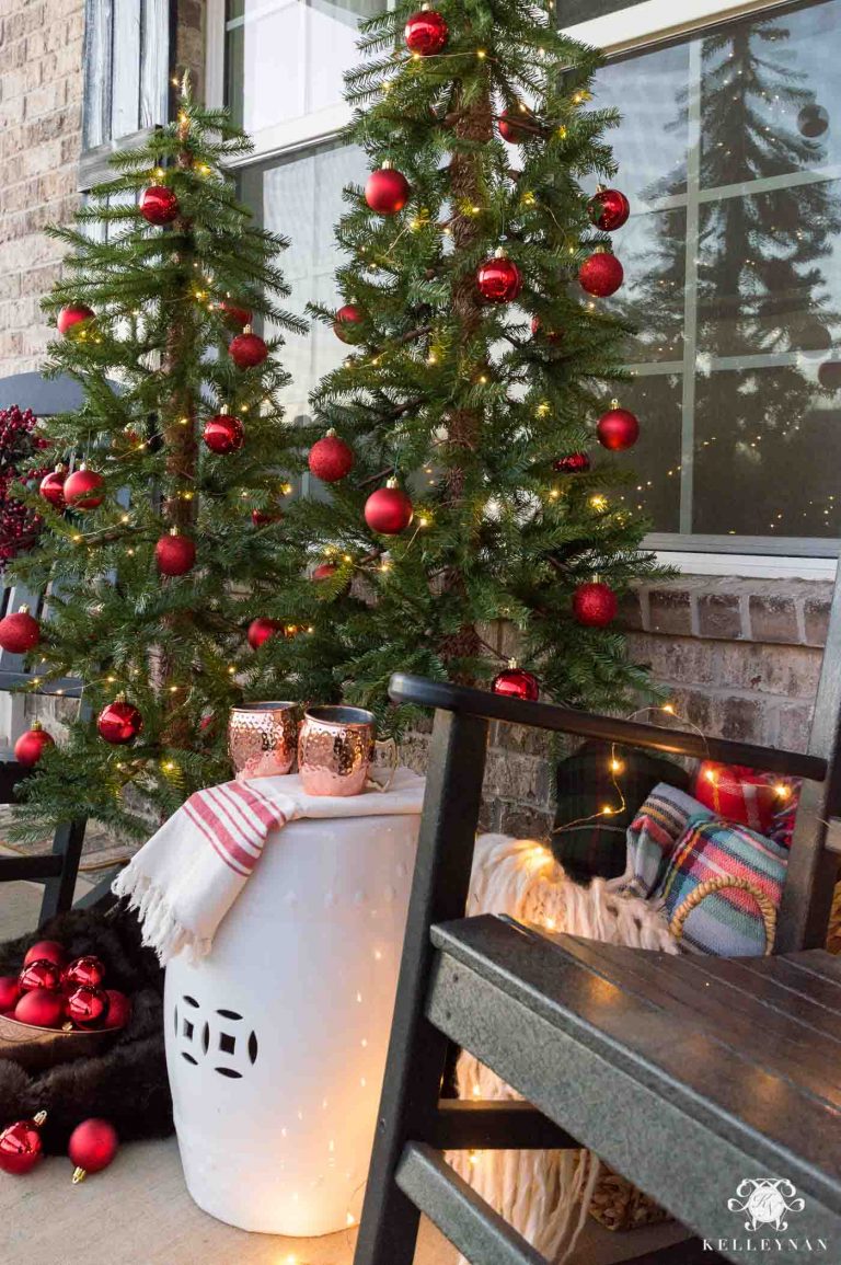 A Twist on Classic Front Porch Christms Decor with Multiple Trees