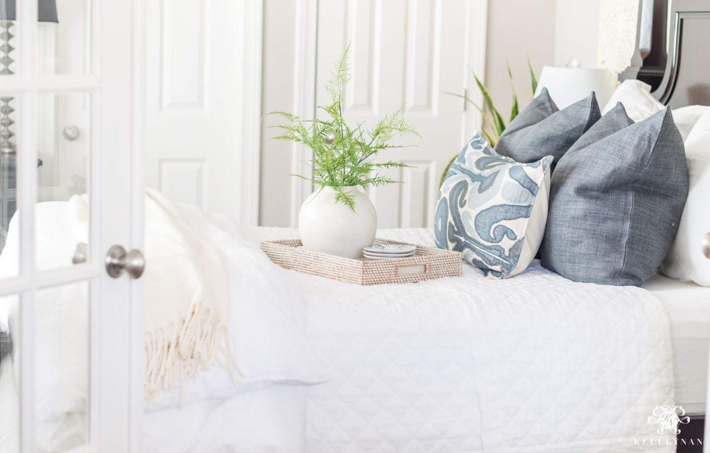 Blue and white guest bedroom neutral bedding