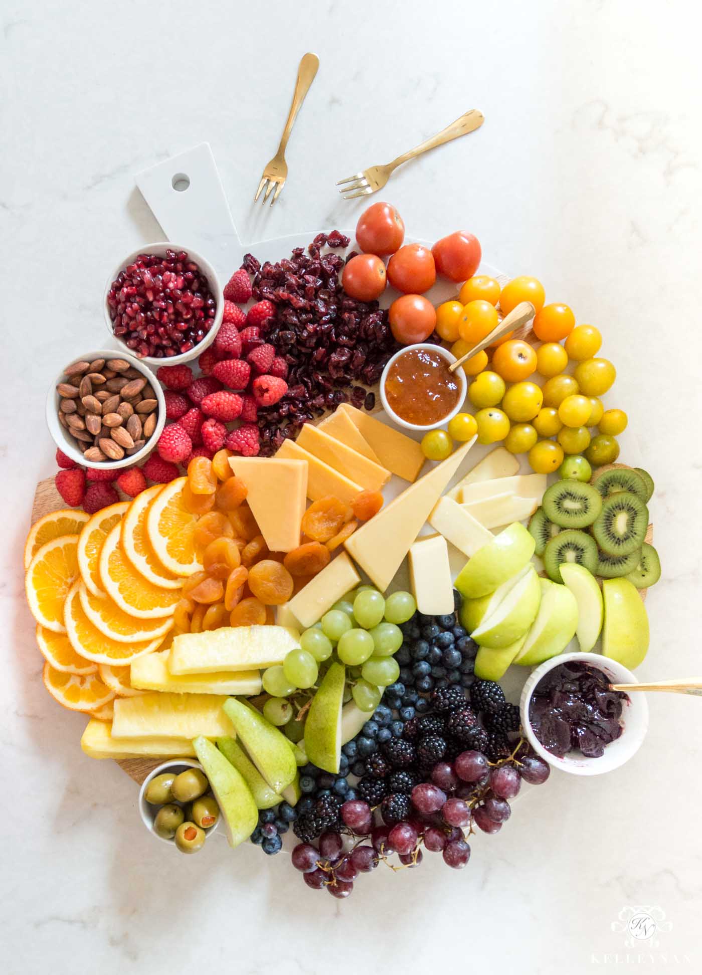 How to make a rainbow fruit and cheese board for St. Patrick's day or any party!