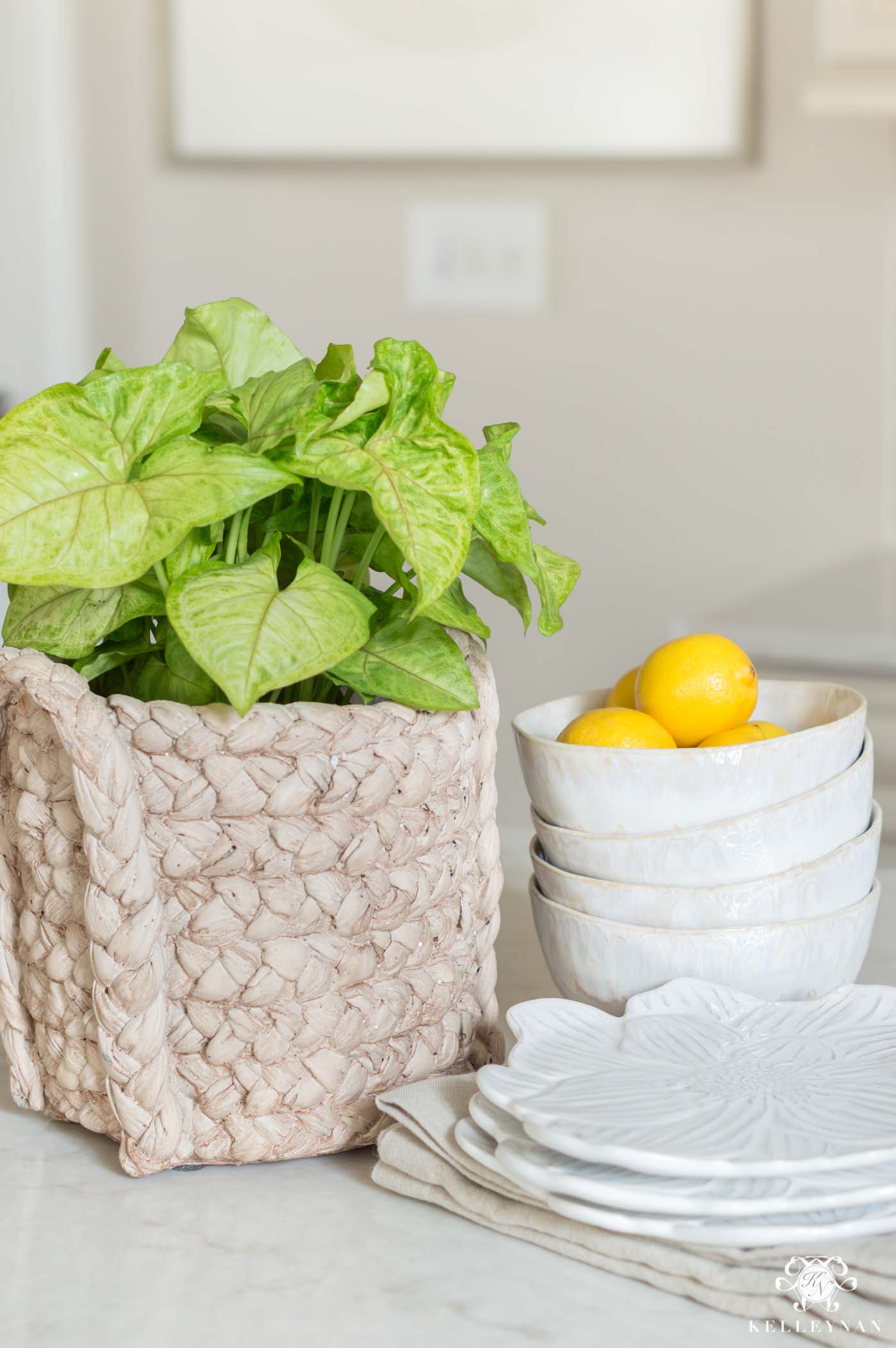 Kitchen Island with Metal Tray of Flowers, Containers and Bowls