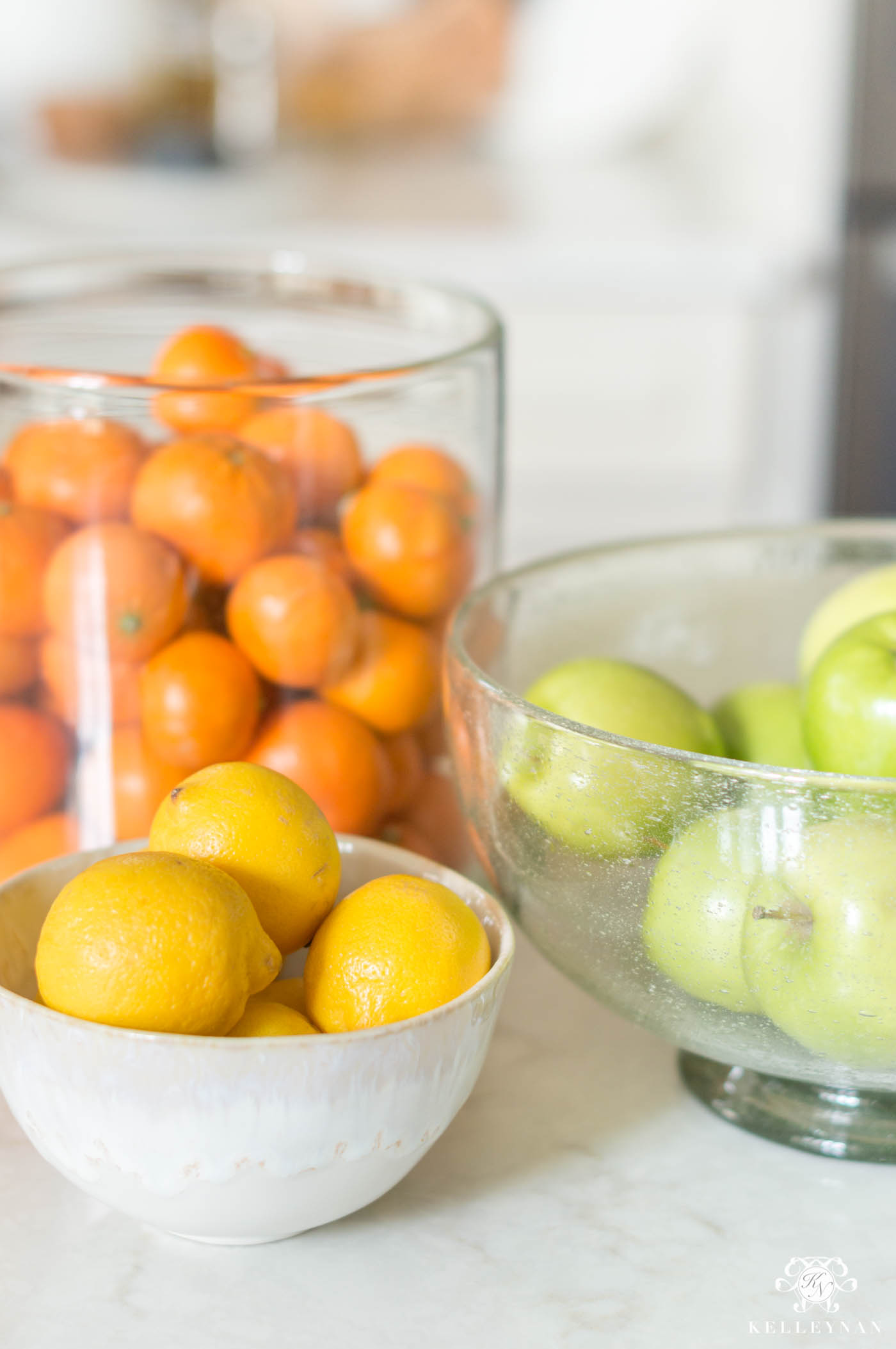 Spring kitchen decorating ideas with citrus fruit, lemons, oranges, and apples