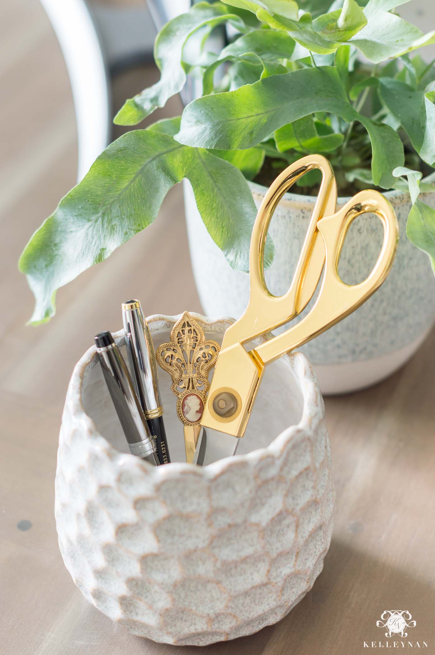 Using a small planter as a desk pencil cup for spring decor