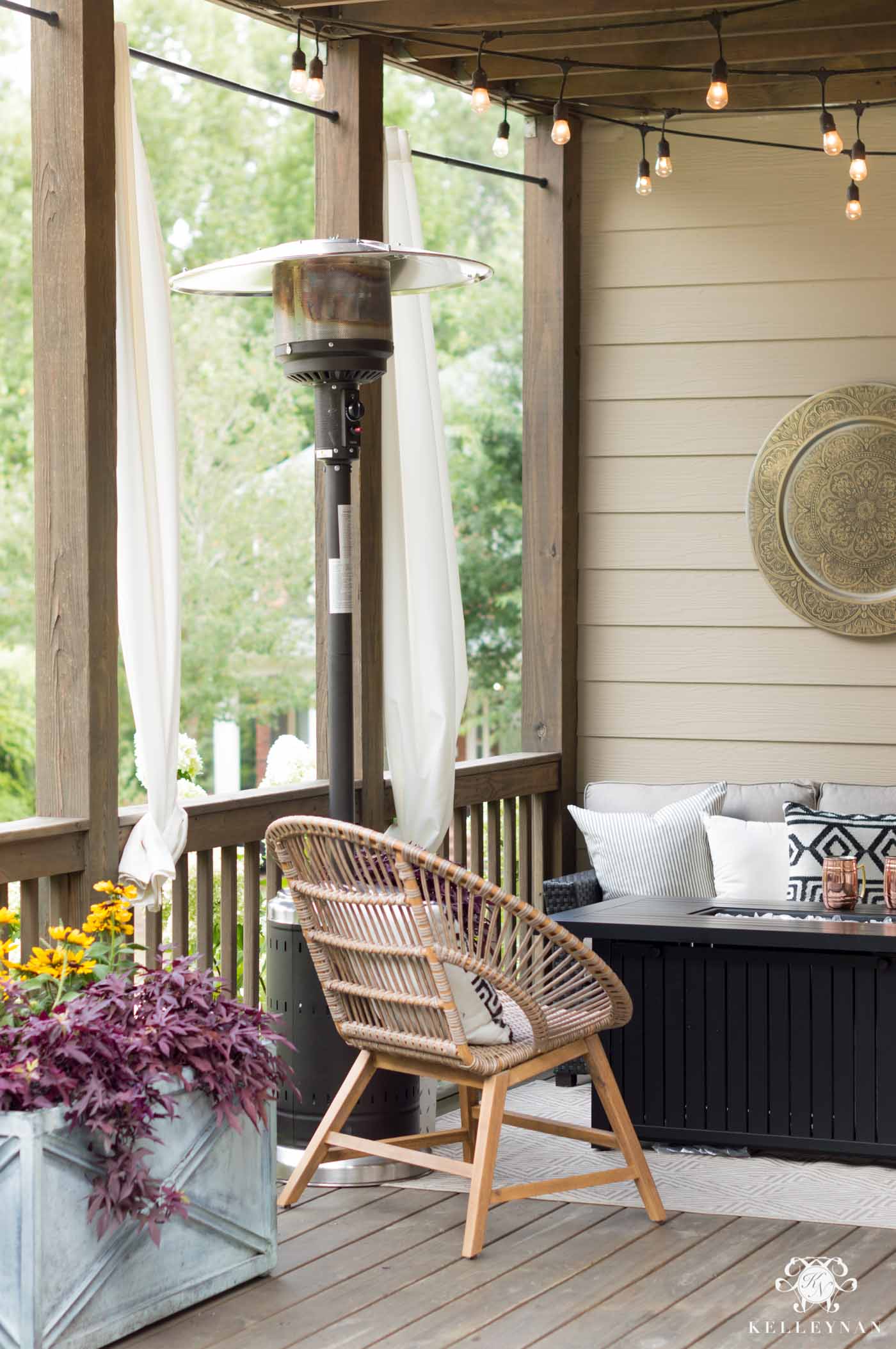 Fall porch necessities with a fire pit and heat lamp