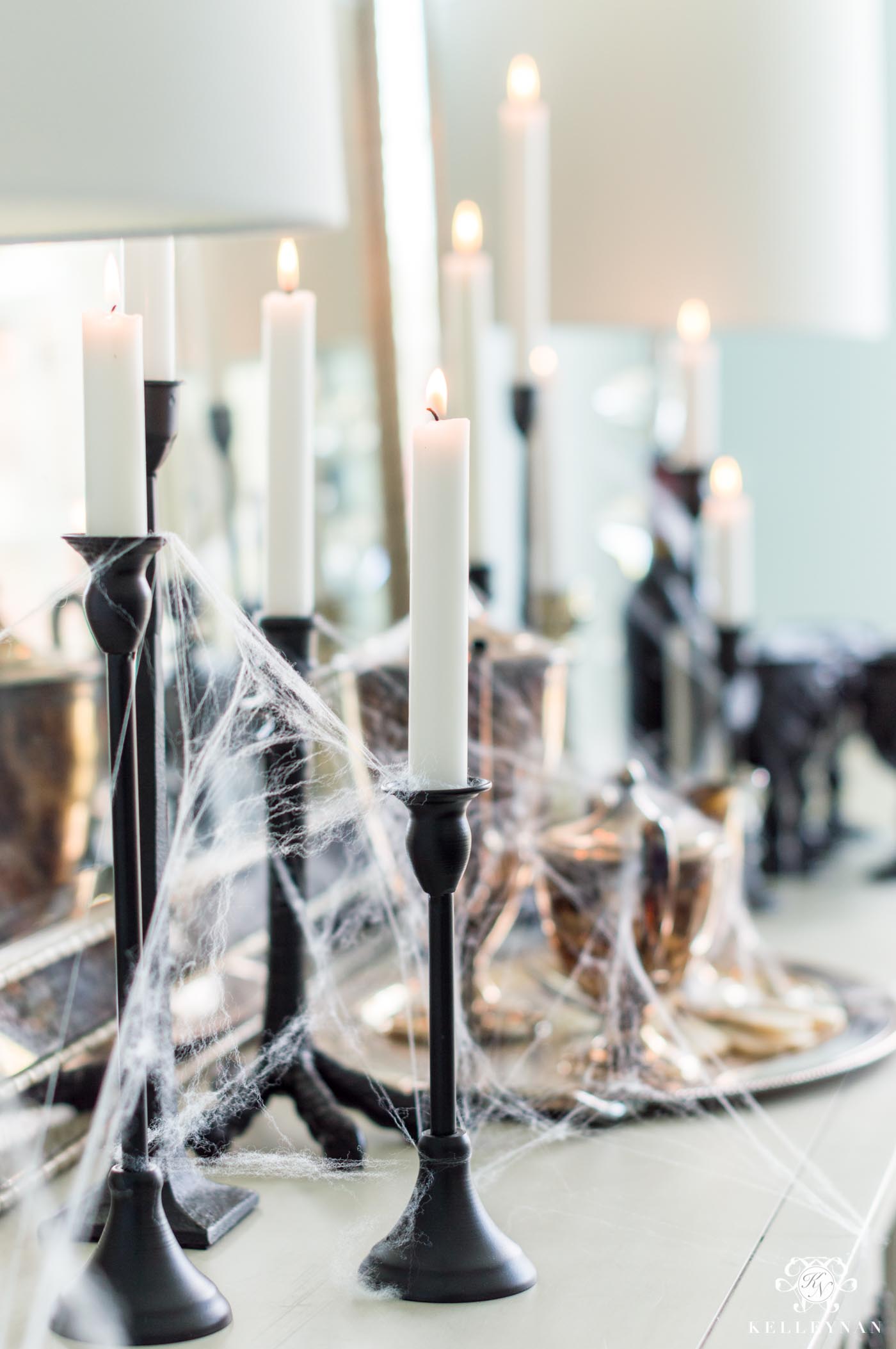 Spooky Halloween Decor Ideas with Candles and Cobwebs